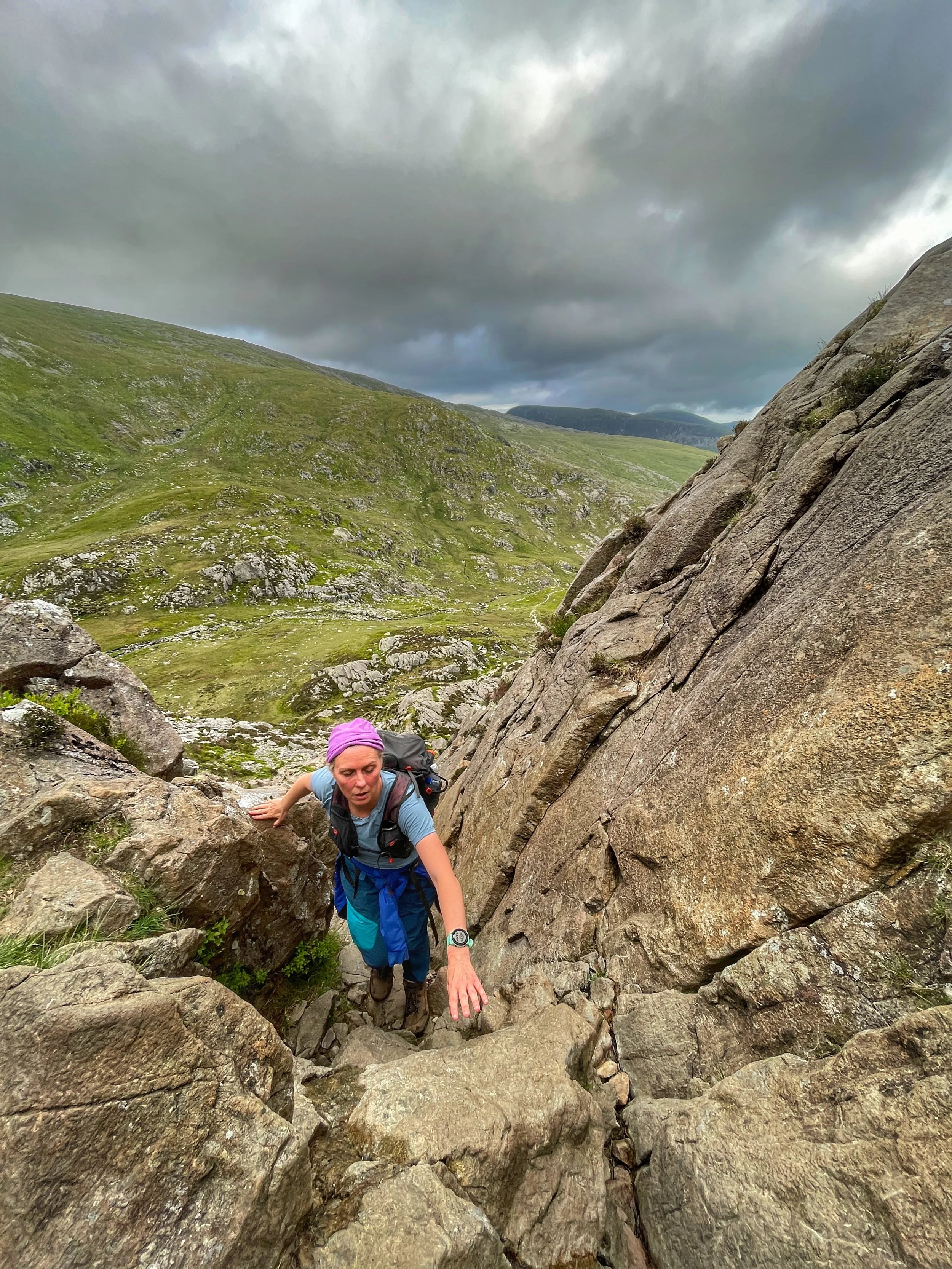Scramblers tackling Grade 1 rock on Pen yr Olwen during the Carneddau Circuit