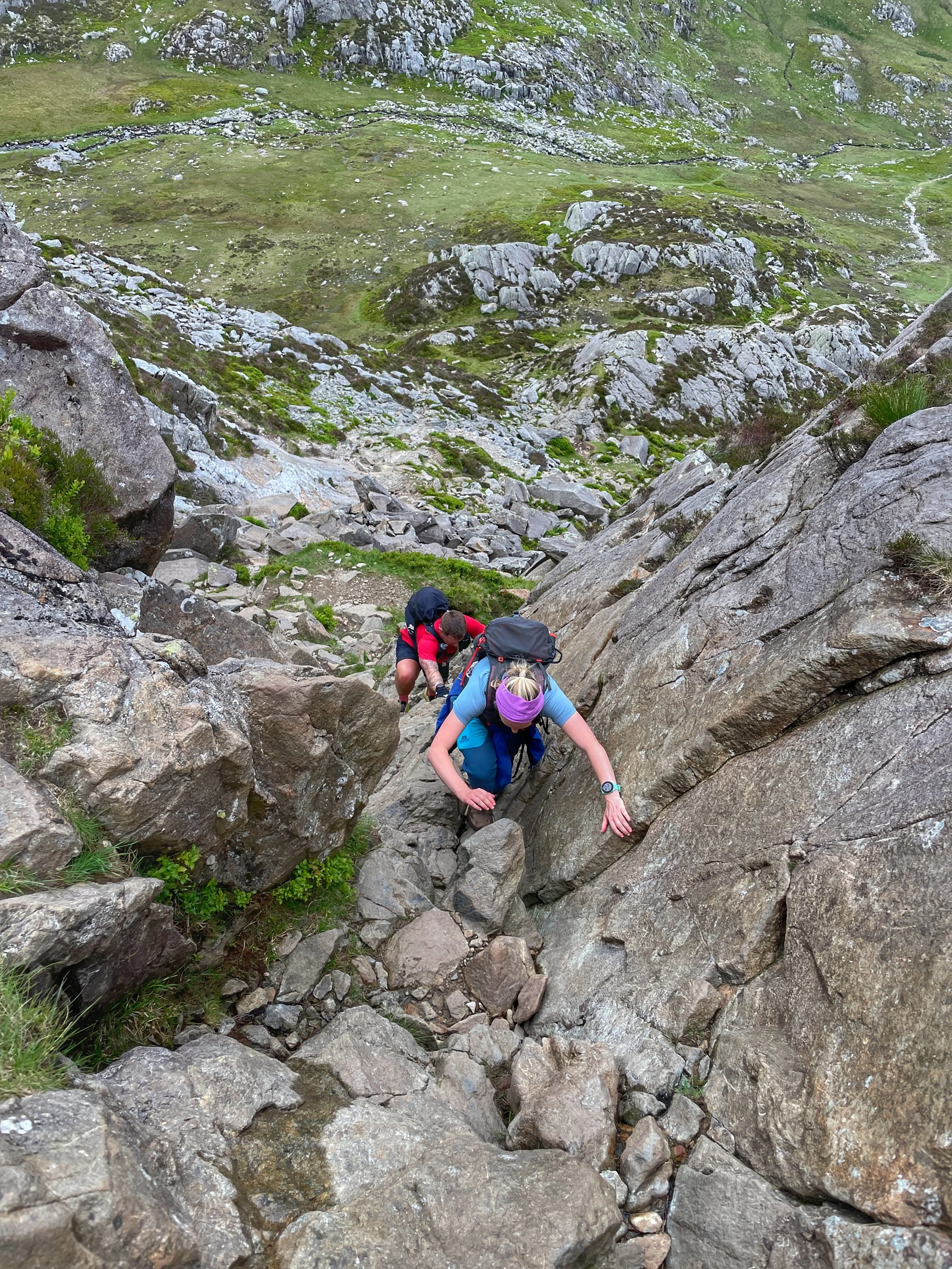 Scramblers tackling Grade 1 rock on Pen yr Olwen during the Carneddau Circuit