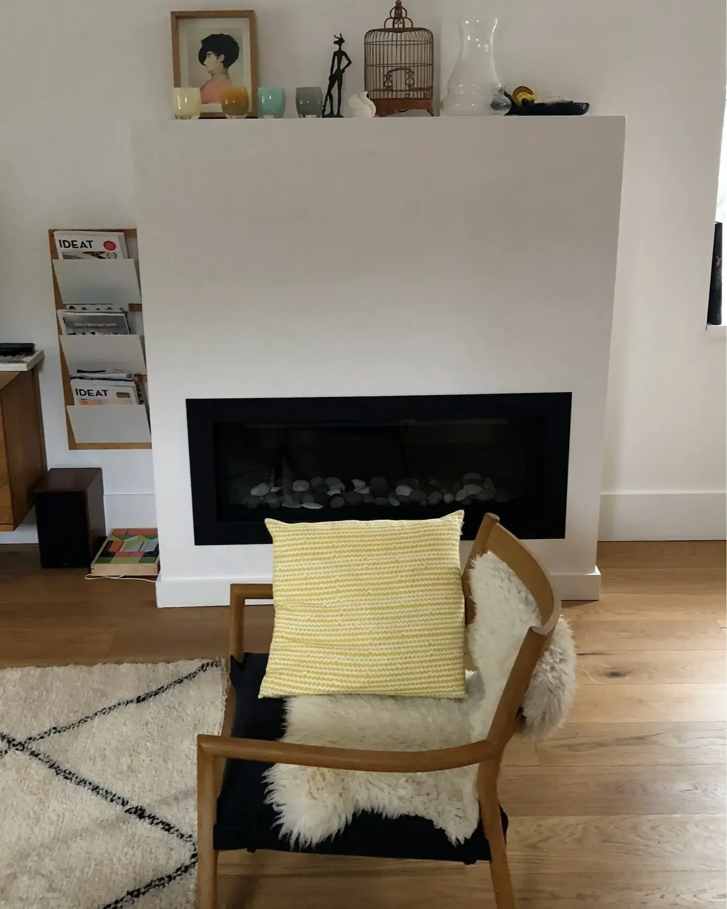Modern linear gas fireplace with white surround  - The Beaches Toronto by Odin Agnuk