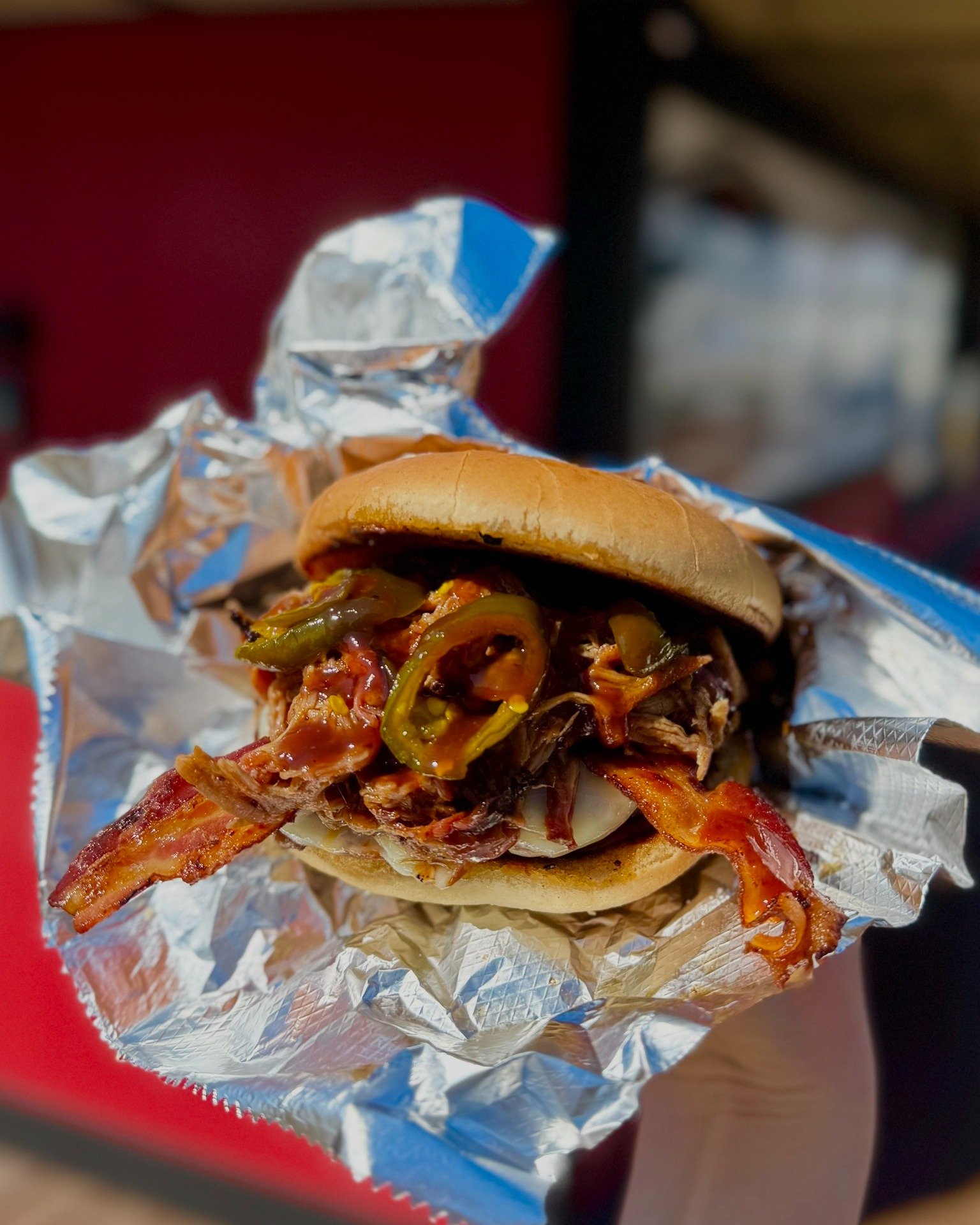 Beautiful day for our Puh-Cow Smash Burger 🔥
A juicy quarter-pound burger stacked high with melted cheese, tender pulled pork, and crispy bacon, all drizzled with rich, smoky BBQ sauce.
