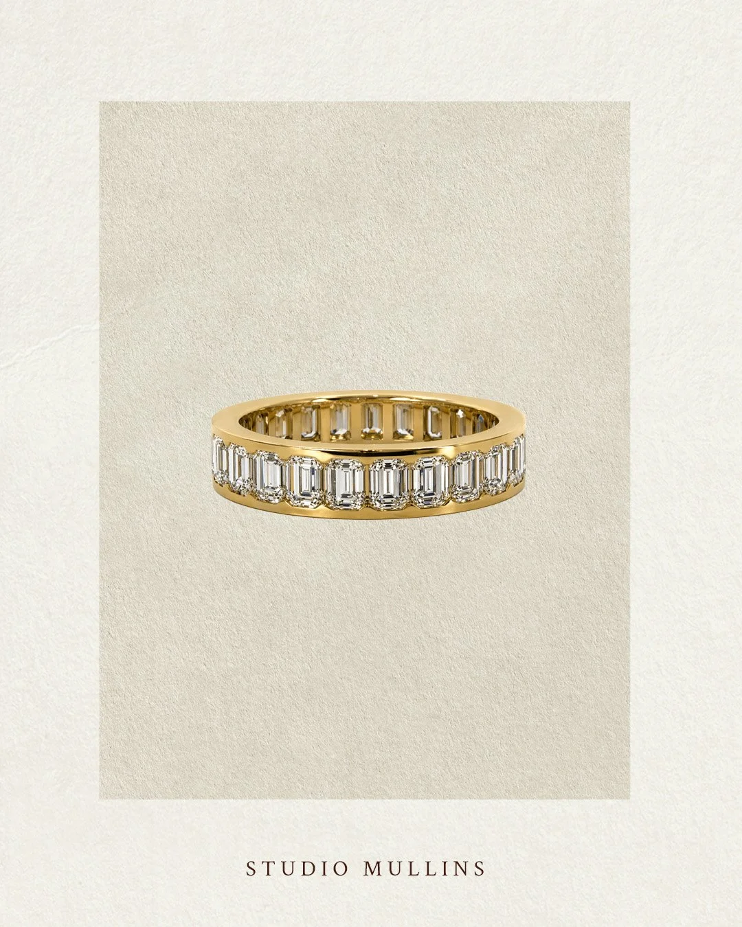 Emerald Semi Bezel Set Eternity Band in 18k Yellow Gold