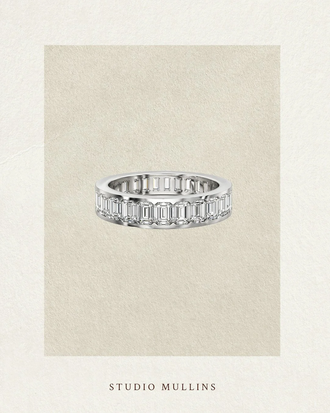 Emerald Semi Bezel Set Eternity Band in Platinum
