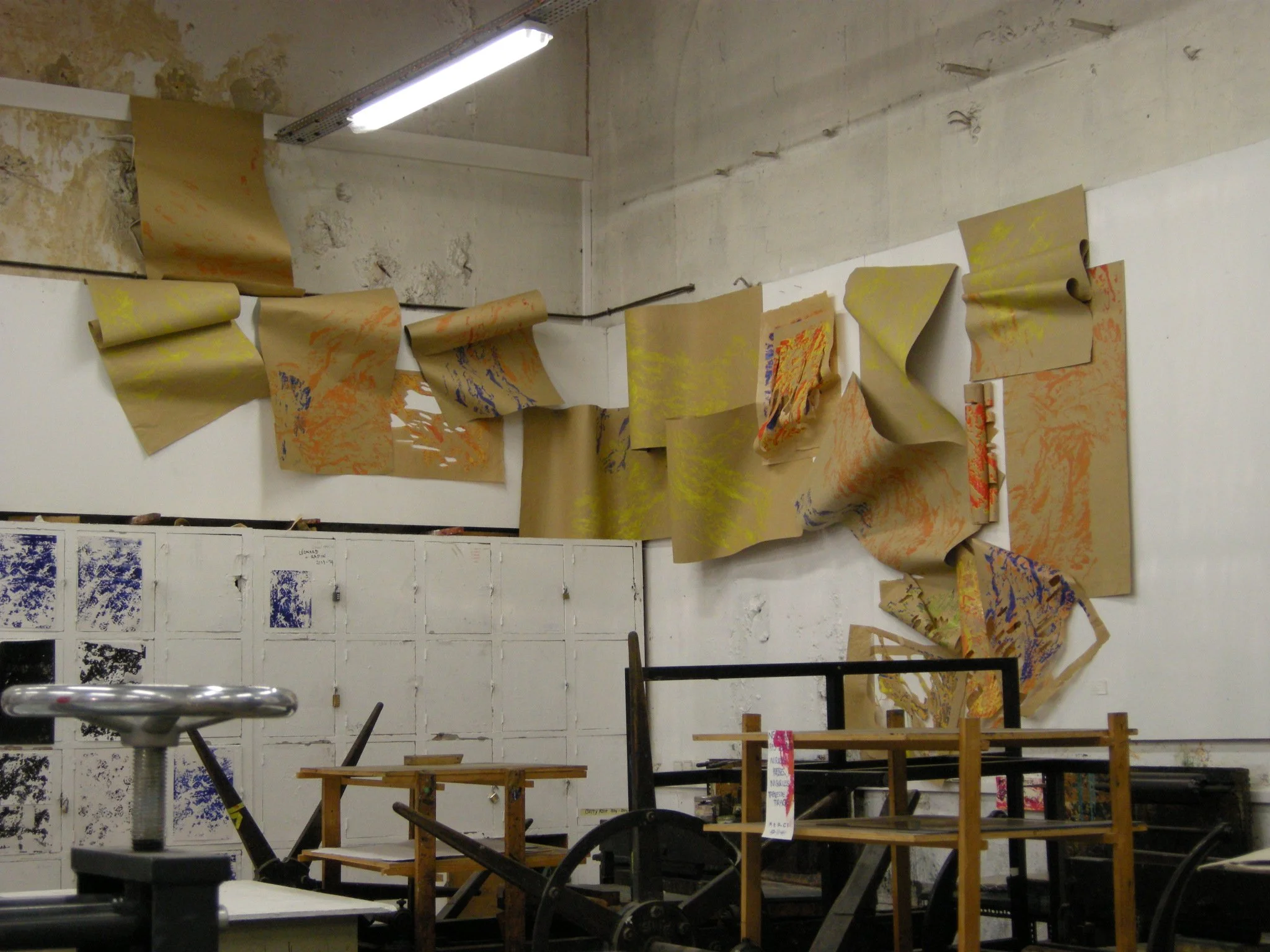  fishes project, 2012, lithography on recycled paper and stencils  Stone lithography made with one fish, multiplied through printing into a school or swarm of prints.  installation views Wernher Bouwens Studio, ENSBA 