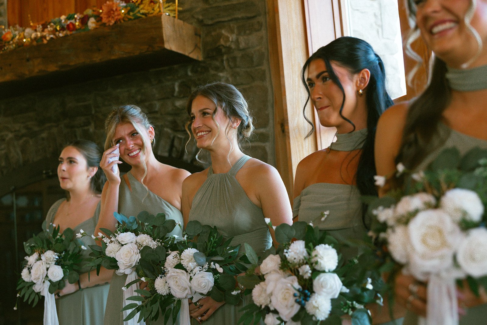 Bridesmaids in matching gray dresses at indoor wedding reception, Snowshoe West Virginia wedding photography, Corduroy Inn