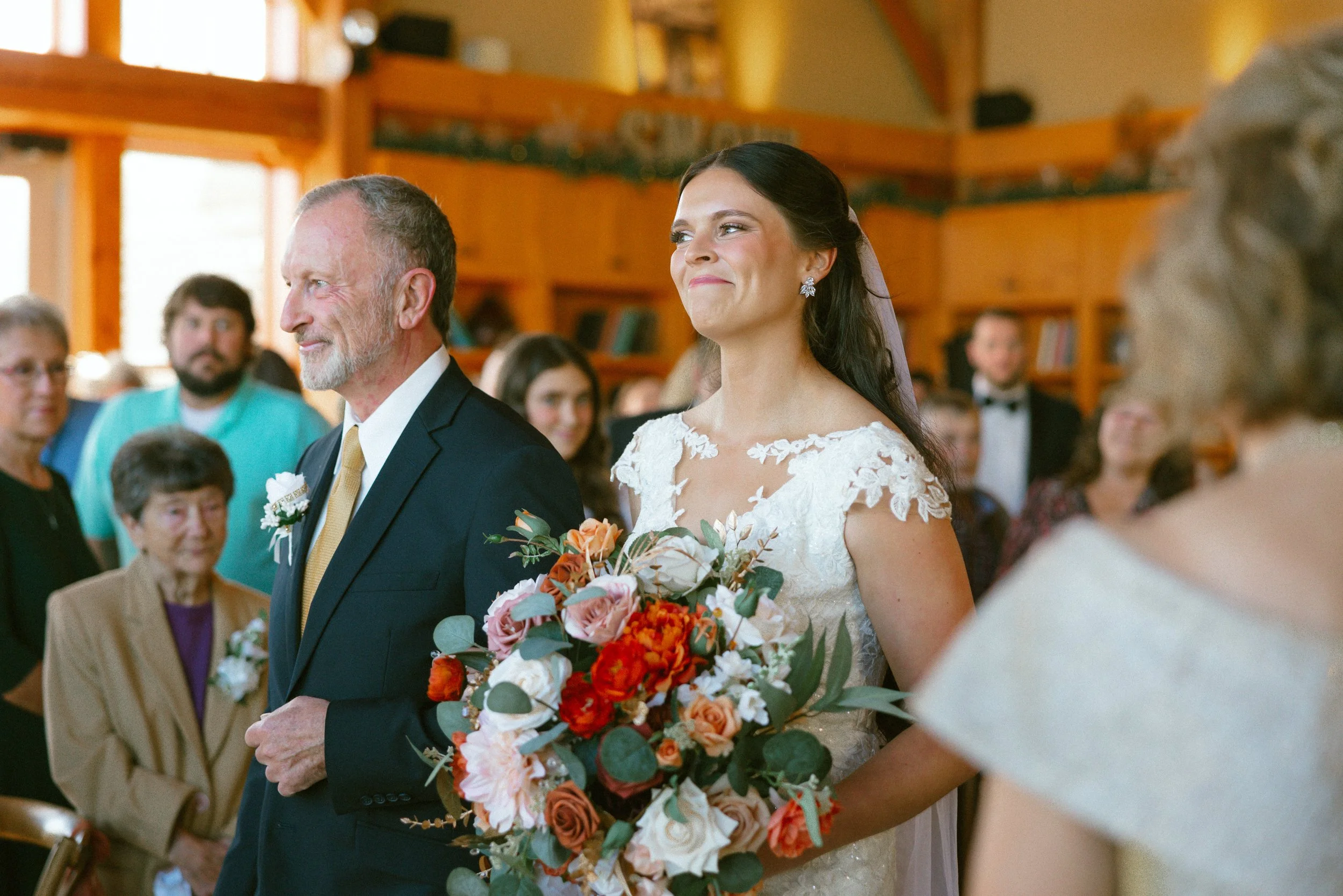 A bride and her father walk down the aisle, small intimate wedding. Snowshoe, West Virginia