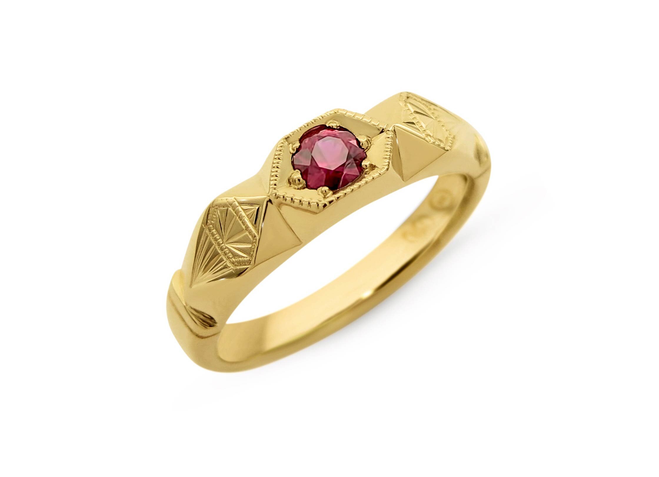 gold-detailed-ruby-ring-geometric-aztec-engraving.jpg