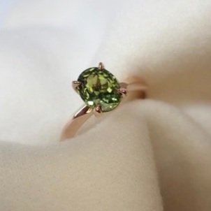 green-oval-sapphire-solitaire-ring.jpg