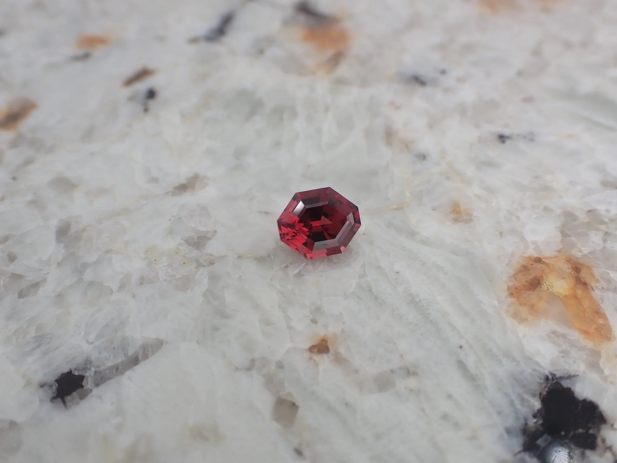 Raspberry red Garnet elongated hexagon cut