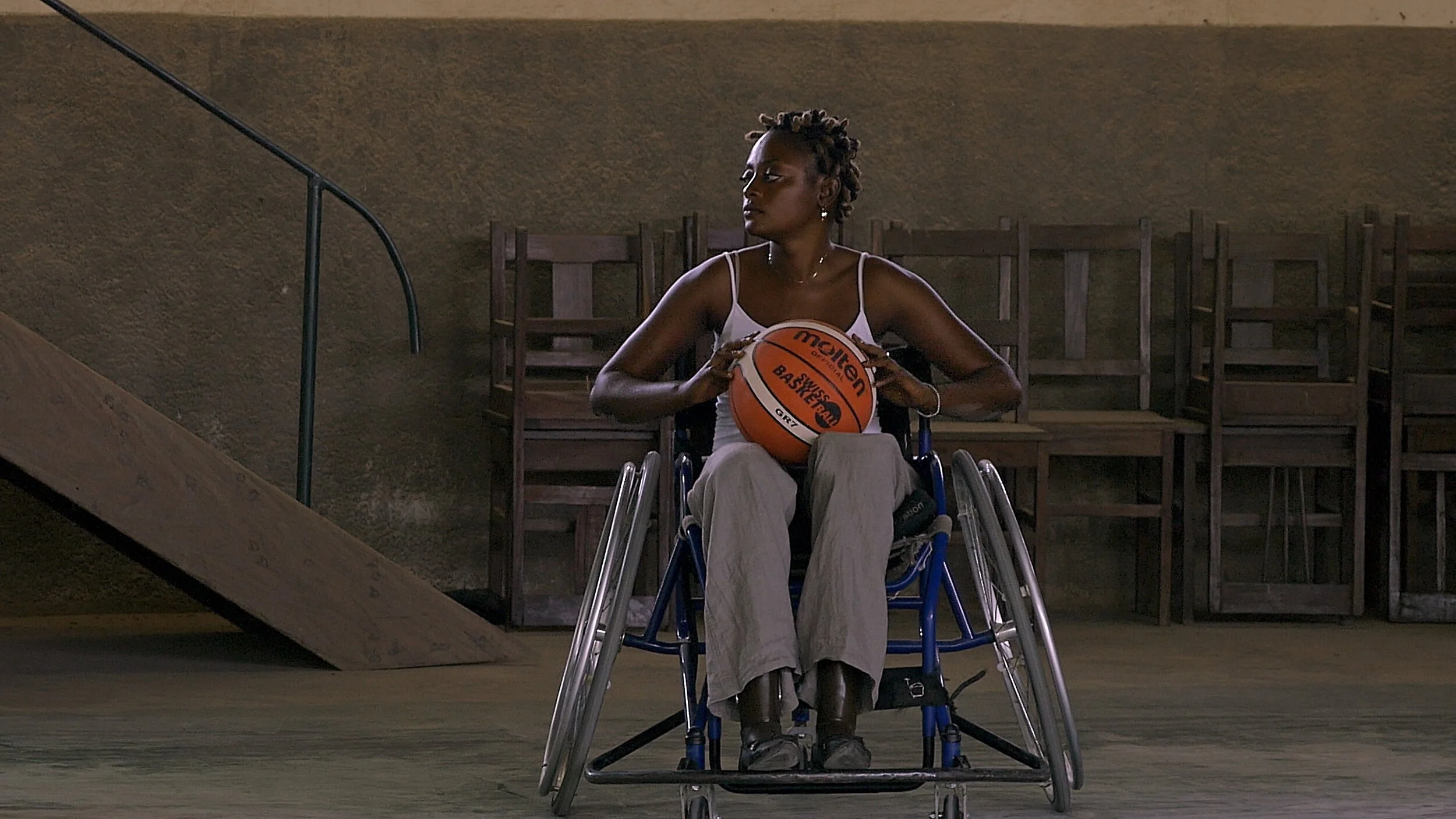 DOWNSTREAM TO KINSHASA 07_Sola with basketball_Courtesy Icarus Films.jpg