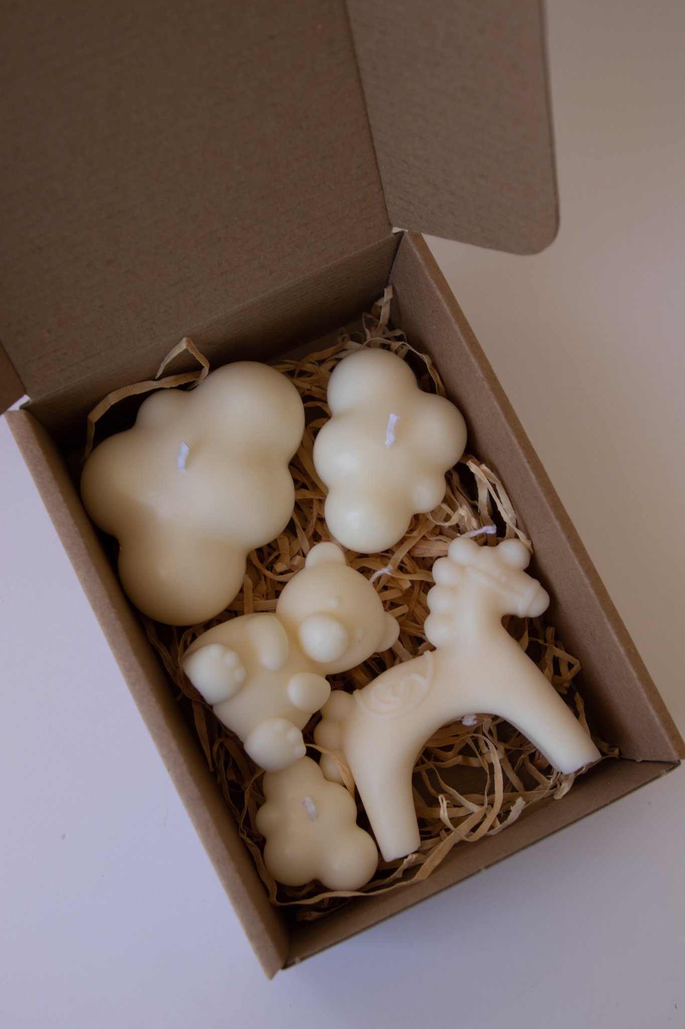 Modern sculptural candles by Em and Me, handmade in New Zealand.