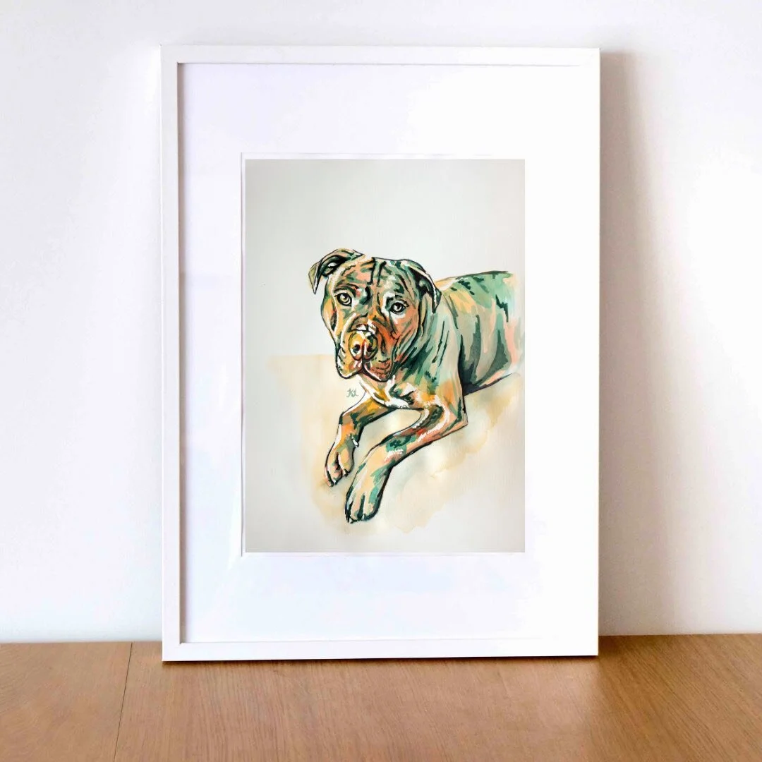 framed green and orange watercolour pet portrait painting of a big dog