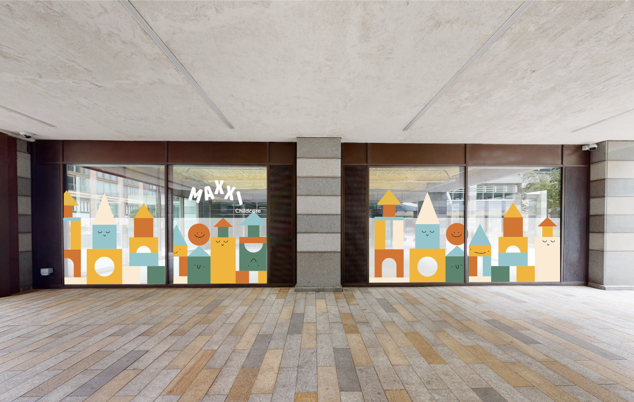 Street-facing childcare centre frontage featuring colourful window graphics inspired by building blocks and playful characters, creating a welcoming and child-friendly identity for an early years learning environment.
