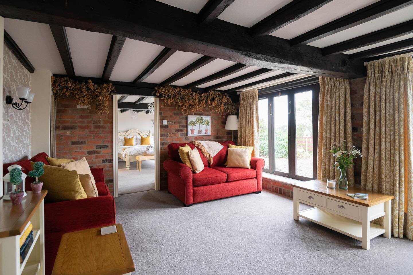 The spacious snug leading to the cosy bedroom in Honeysuckle Cottage, the perfect setting for a peaceful and relaxing romantic getaway with your love 🧡 ⁠⠀
⁠⠀
We're pet friendly too so you don't have to leave your four-legged friend at home! 🐶⁠⠀
⁠⠀
