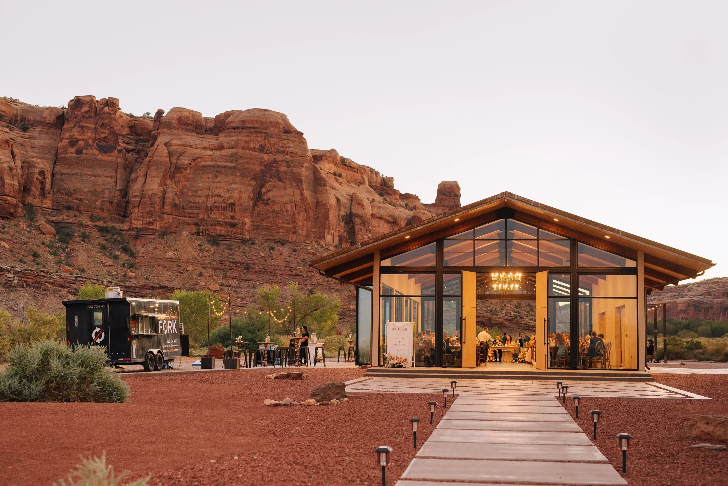 Just after sunset front patio and south patio views looking toward Red Earth Venue from the front. Photo by Maggie Bradshaw Photography