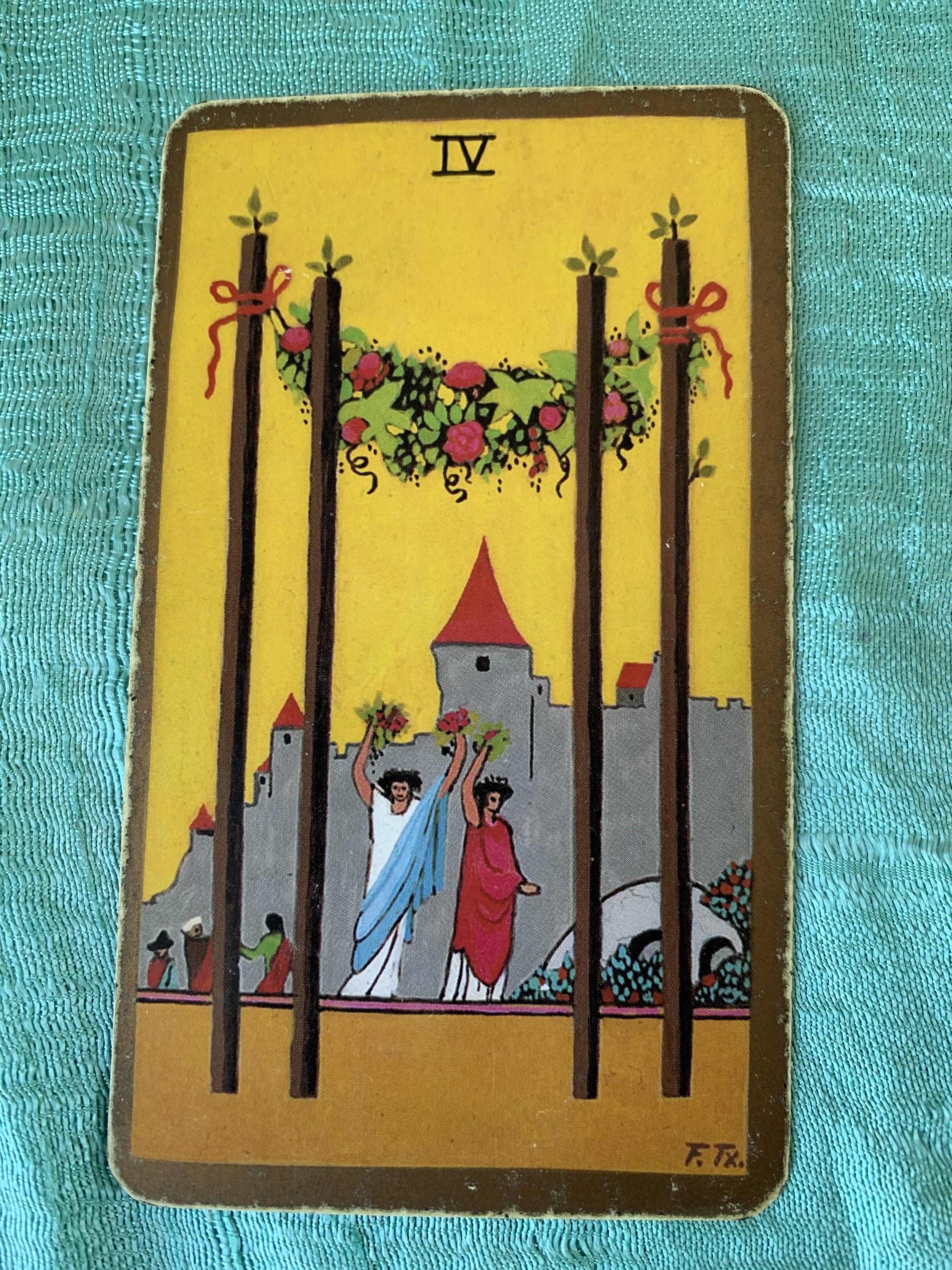 The Four of Wands is a time to be optimistic.