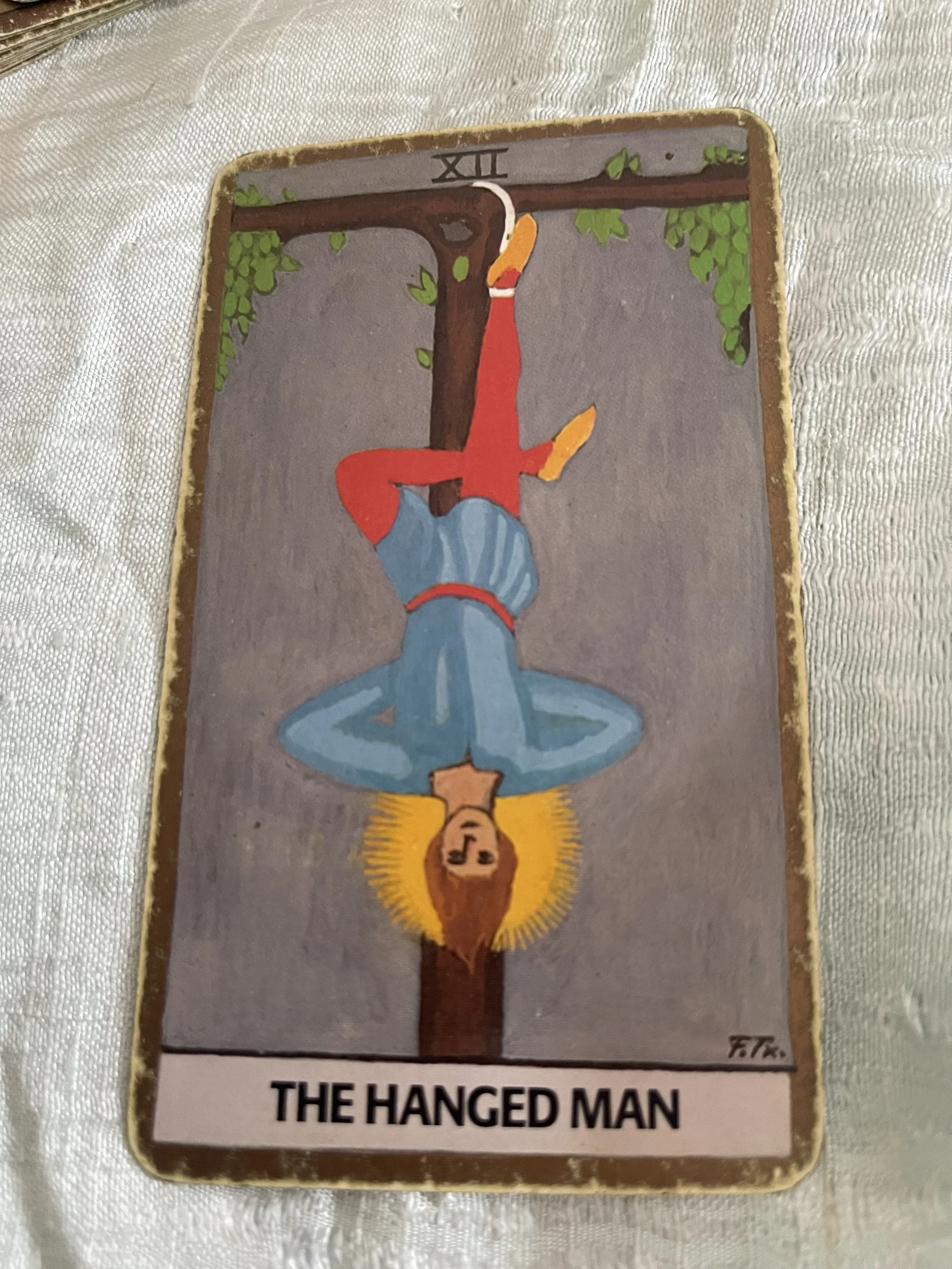What does the Hanged Man mean in a tarot reading?