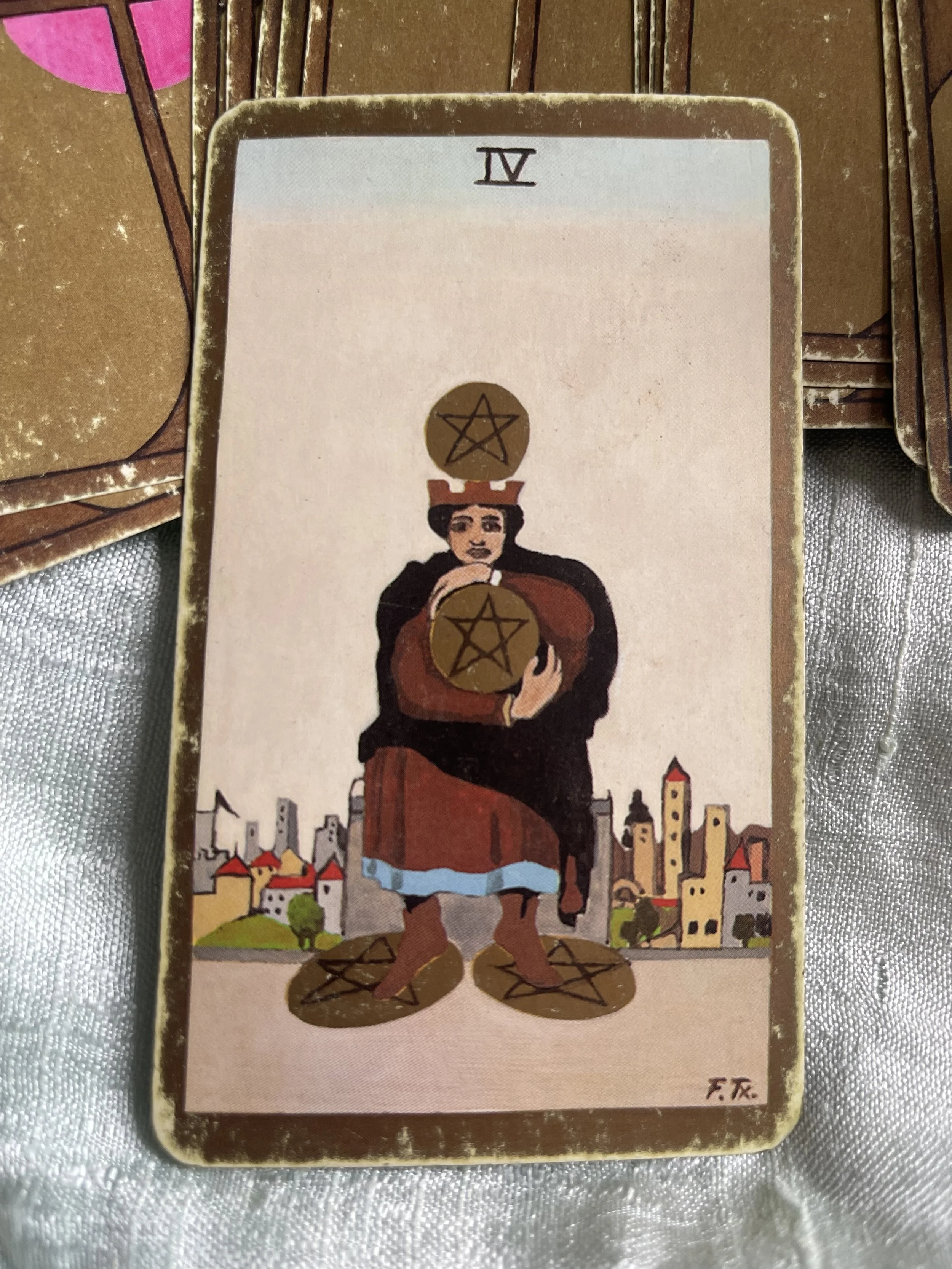 What does the Four of Pentacles mean?