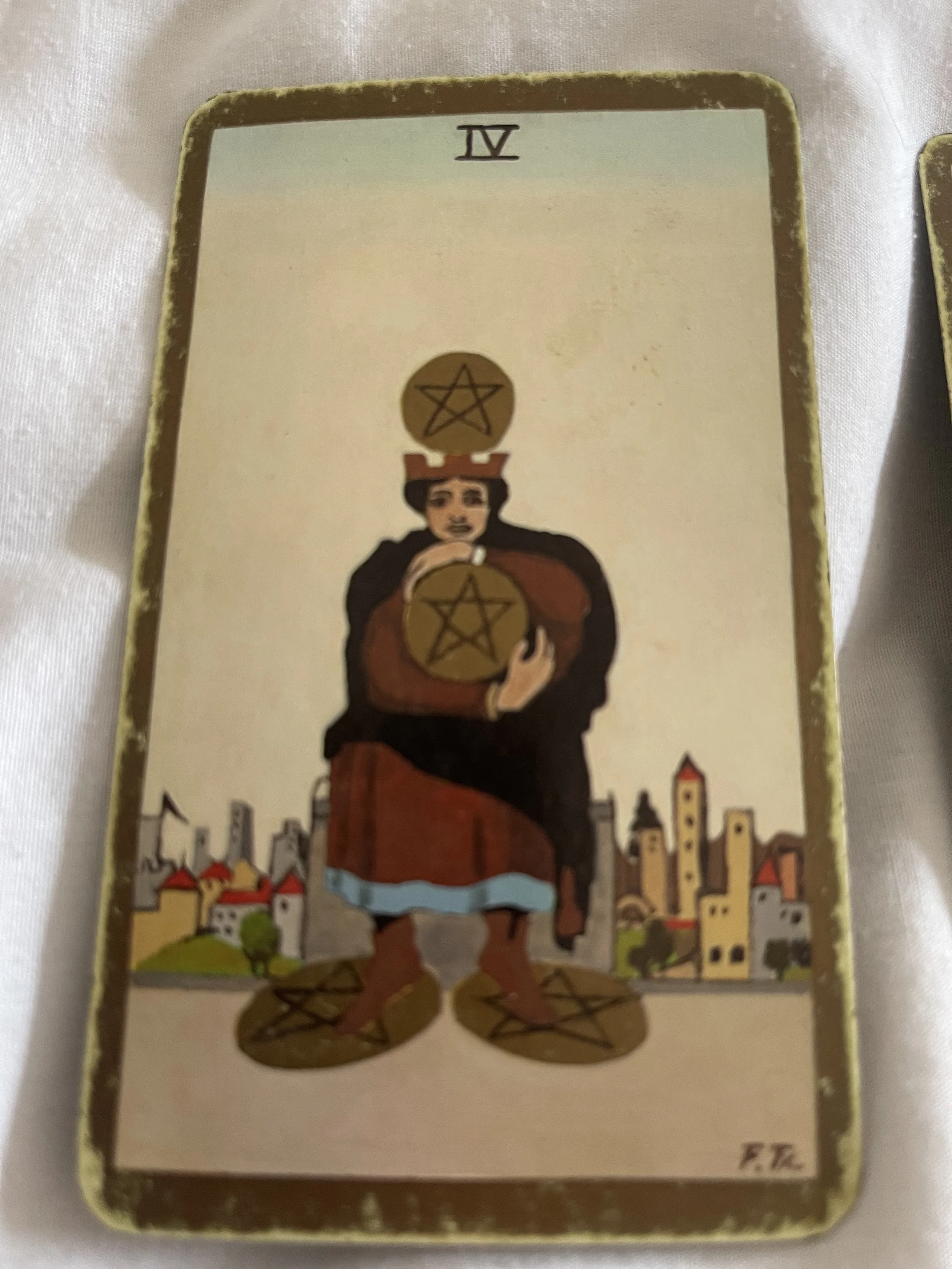 four of pentacles