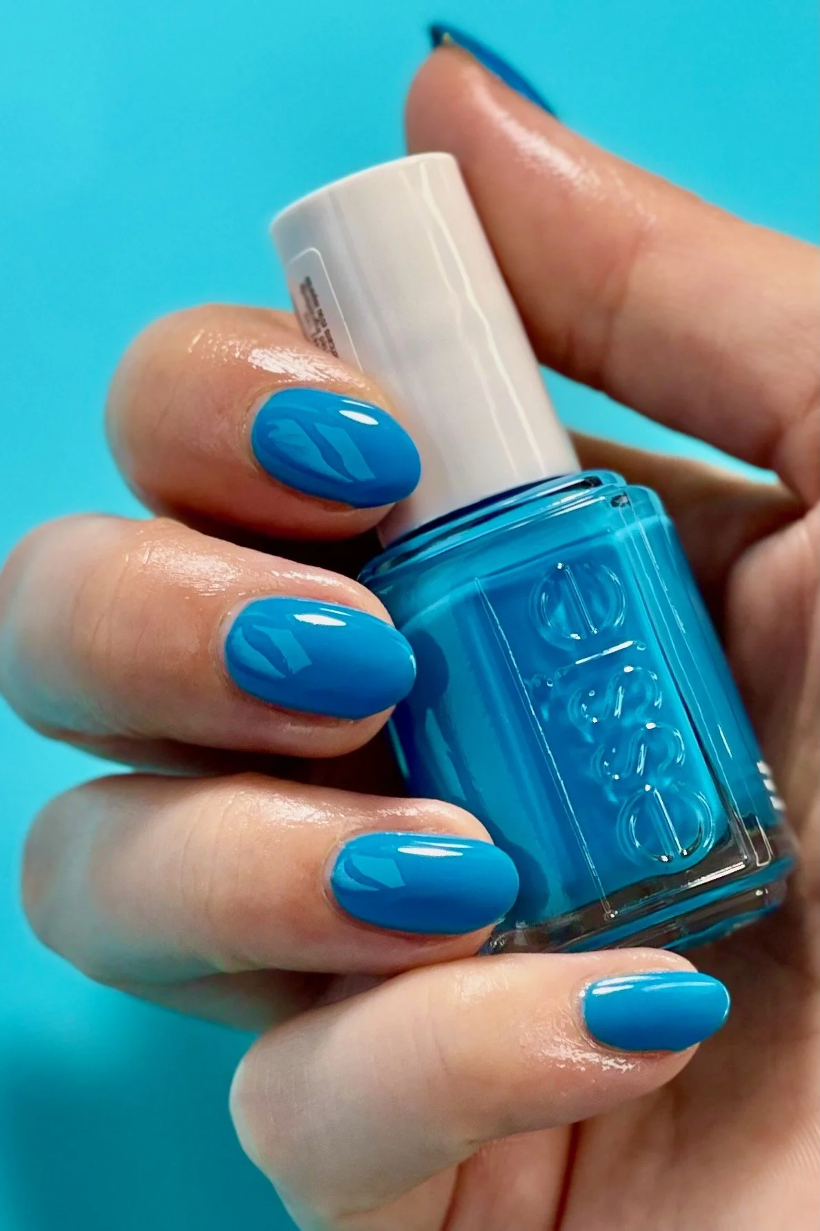 Essie Off Beat Chic - a bright cyan blue nail color