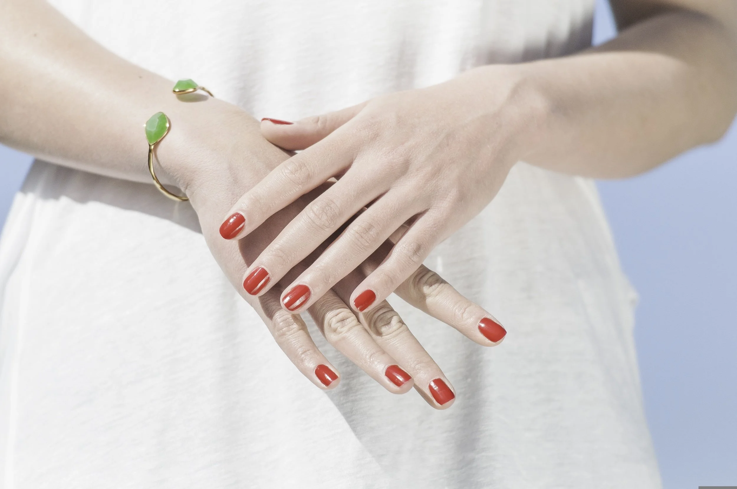 Image of red manicured hands by Harry Fichtner from Pixabay