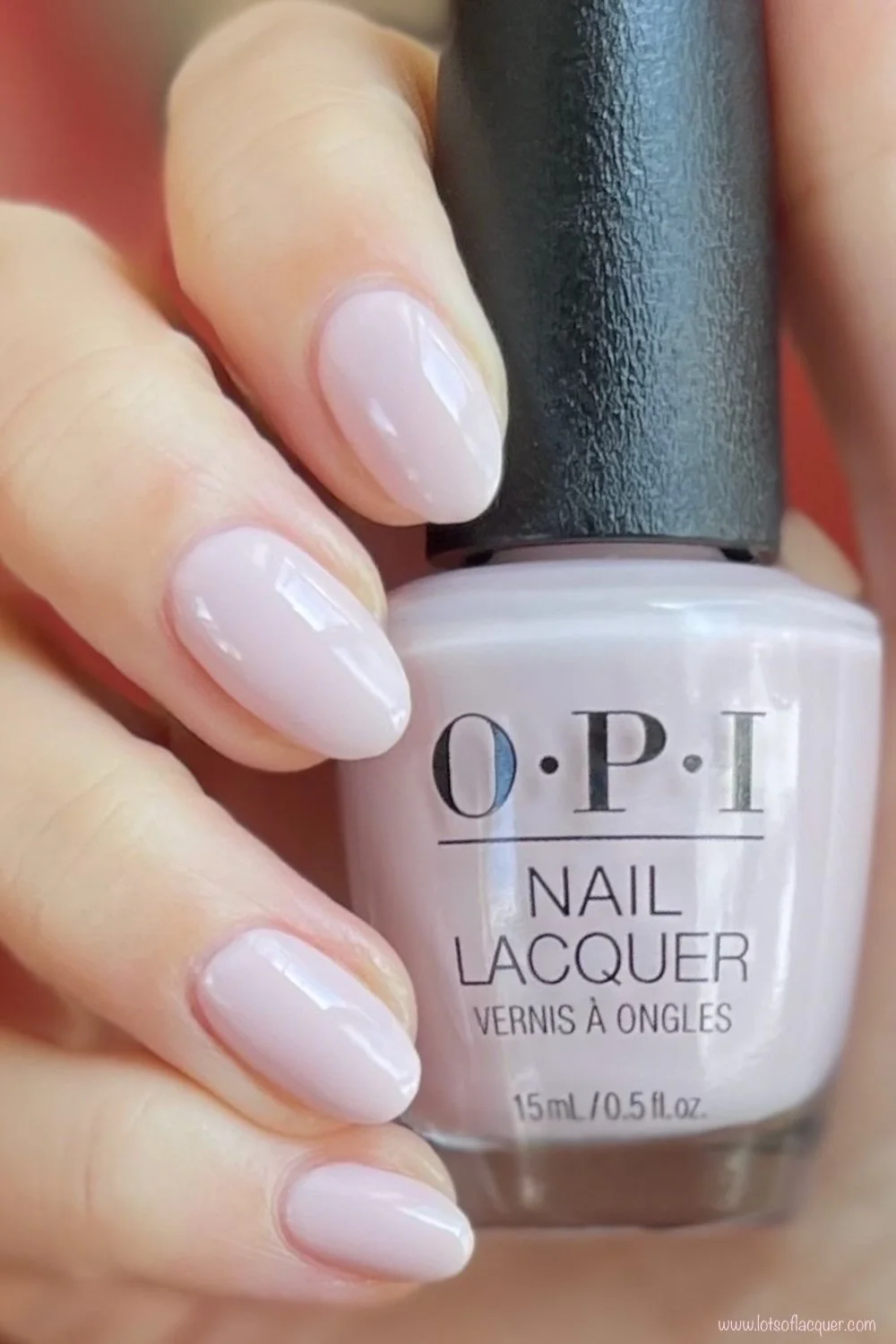 Gifted by Beyond Polish / OPI’m a Bubble Bunny swatch holding bottle