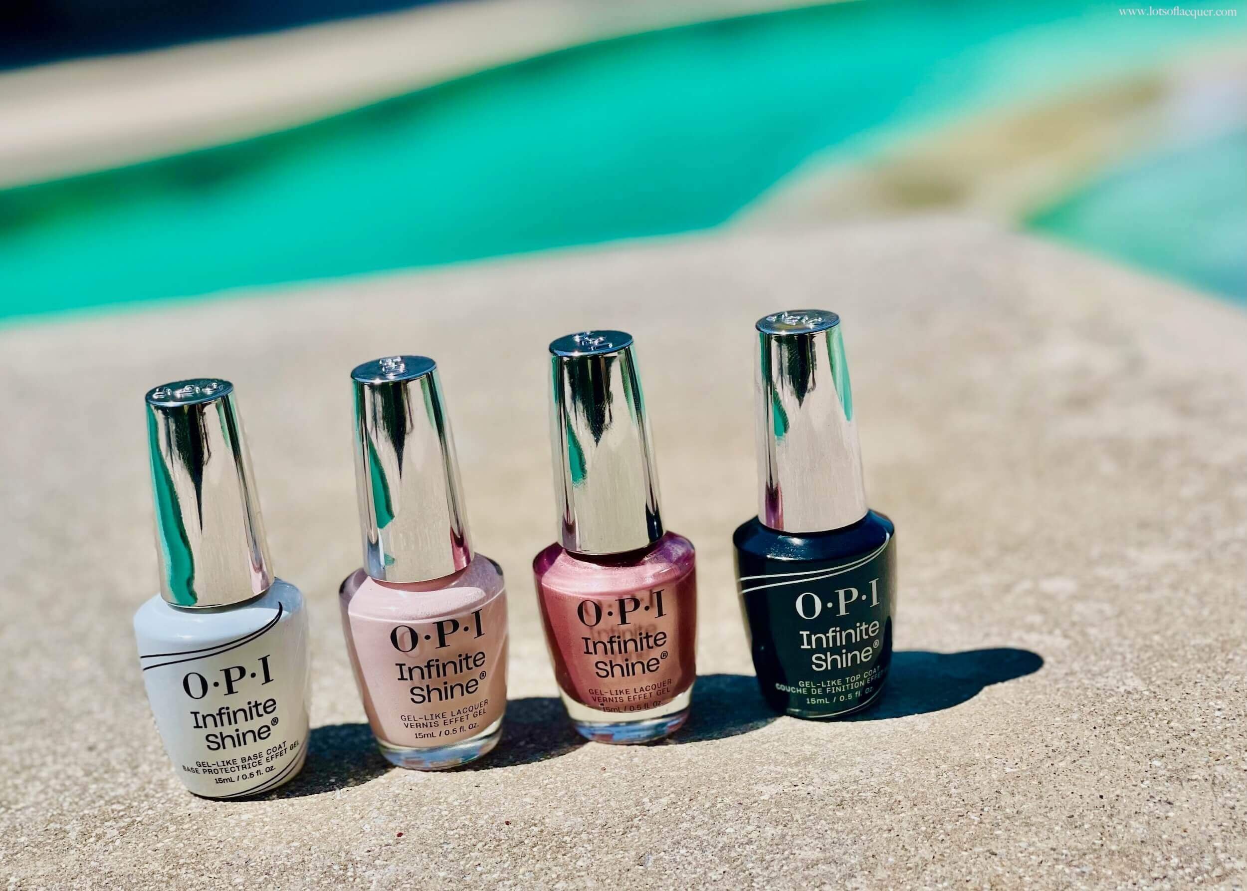 OPI Infinite Shine System on poolside surface with light pink shades