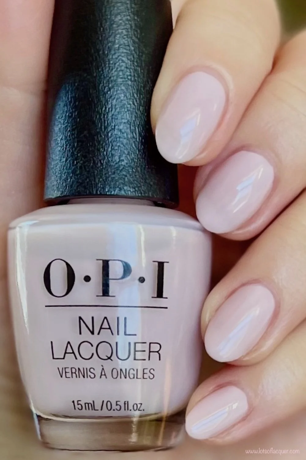 Gifted by Beyond Polish / OPI’m a Bubble Bunny swatch holding bottle