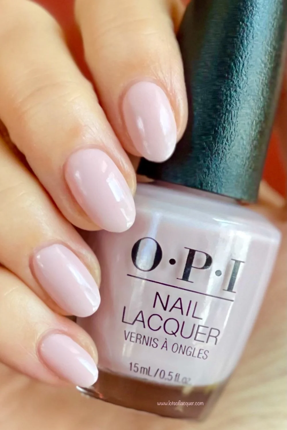 Gifted by Beyond Polish / OPI’m a Bubble Bunny swatch holding bottle