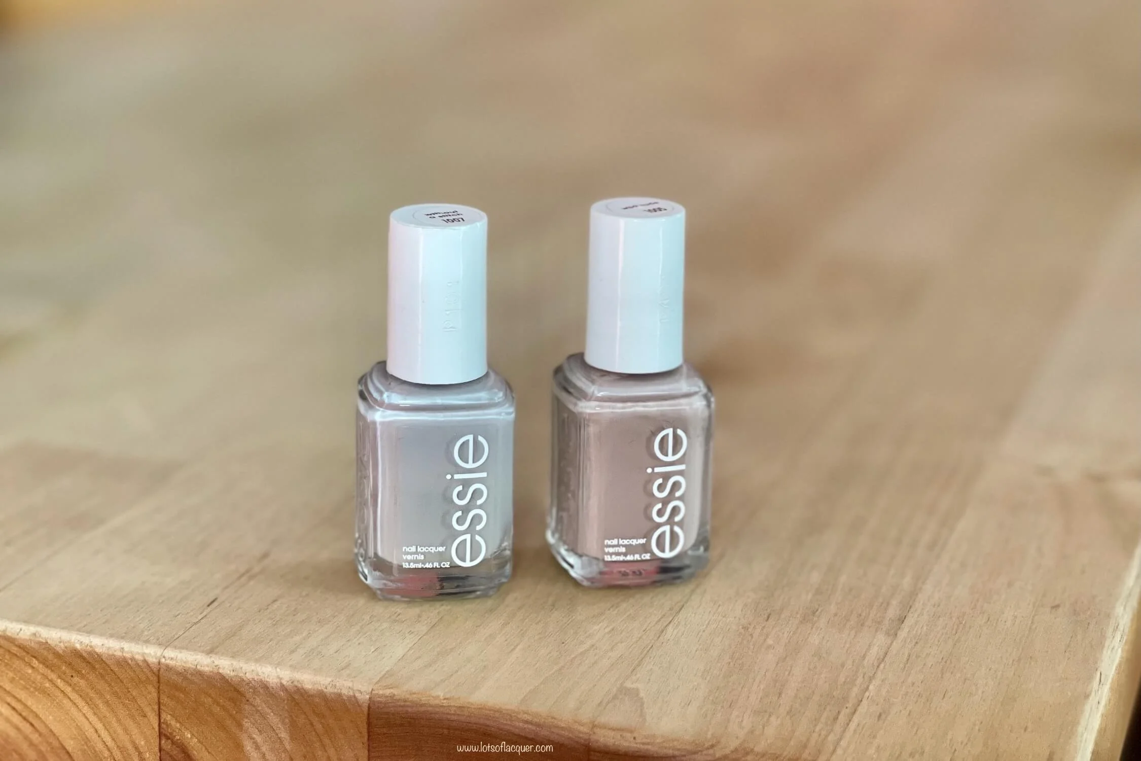 bottles of essie without a stitch and wild nude