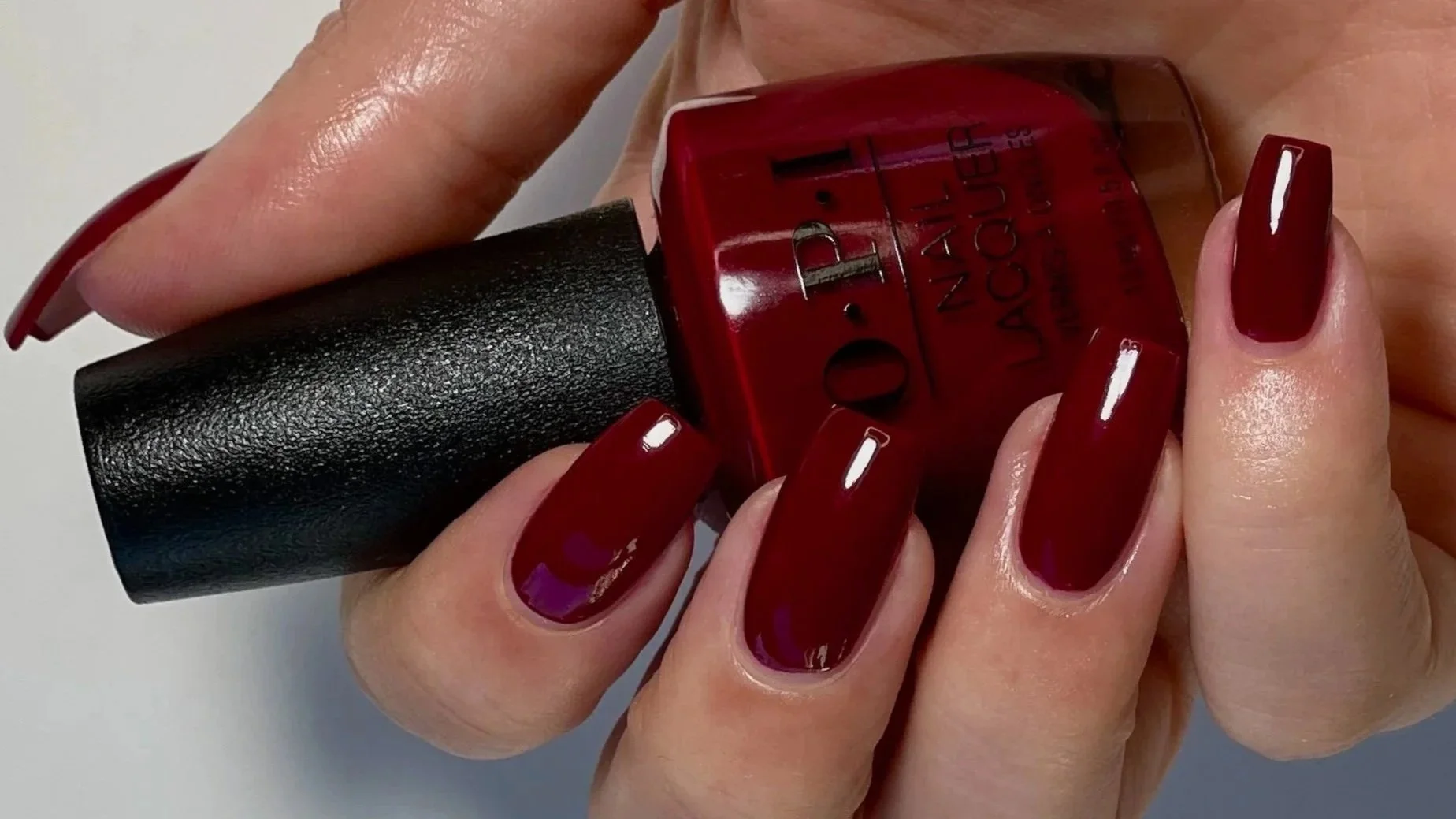 OPI Malaga Wine VS Got the Blues for Red