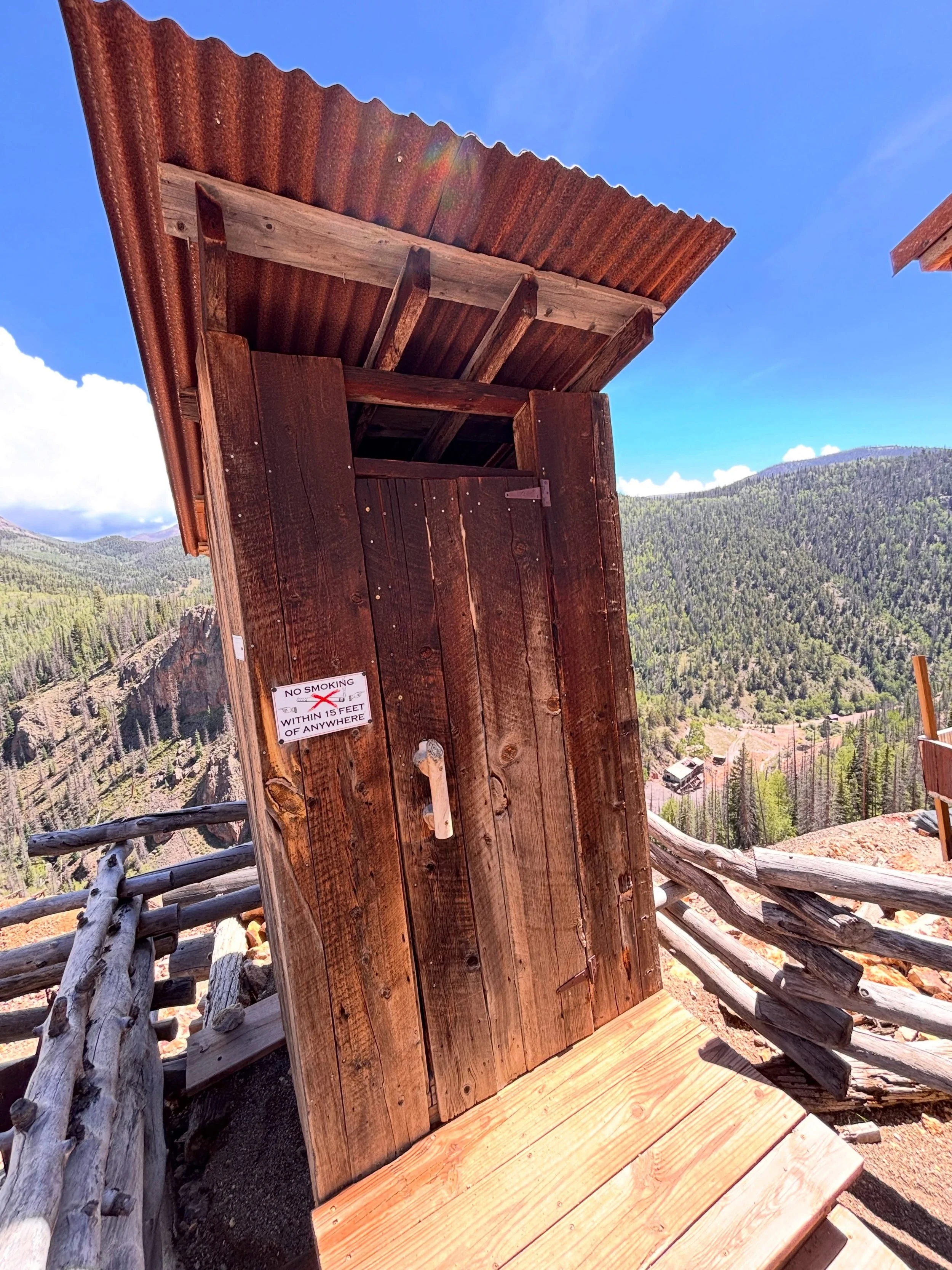 For a woman with height anxiety, this port-a-potty on the side of a mining mountain cliff was the ultimate test. #vanlife