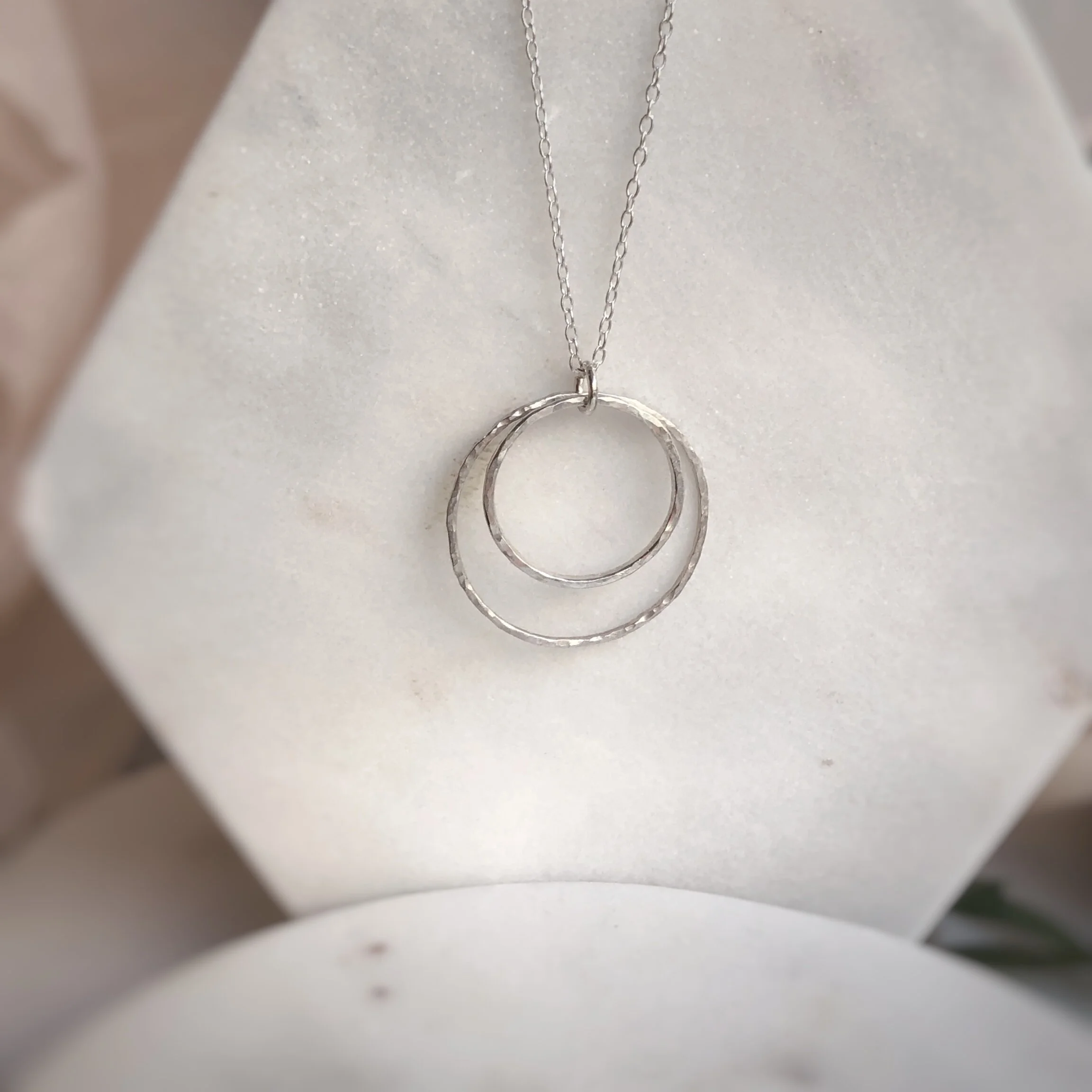 Silver circles in the sand pendant