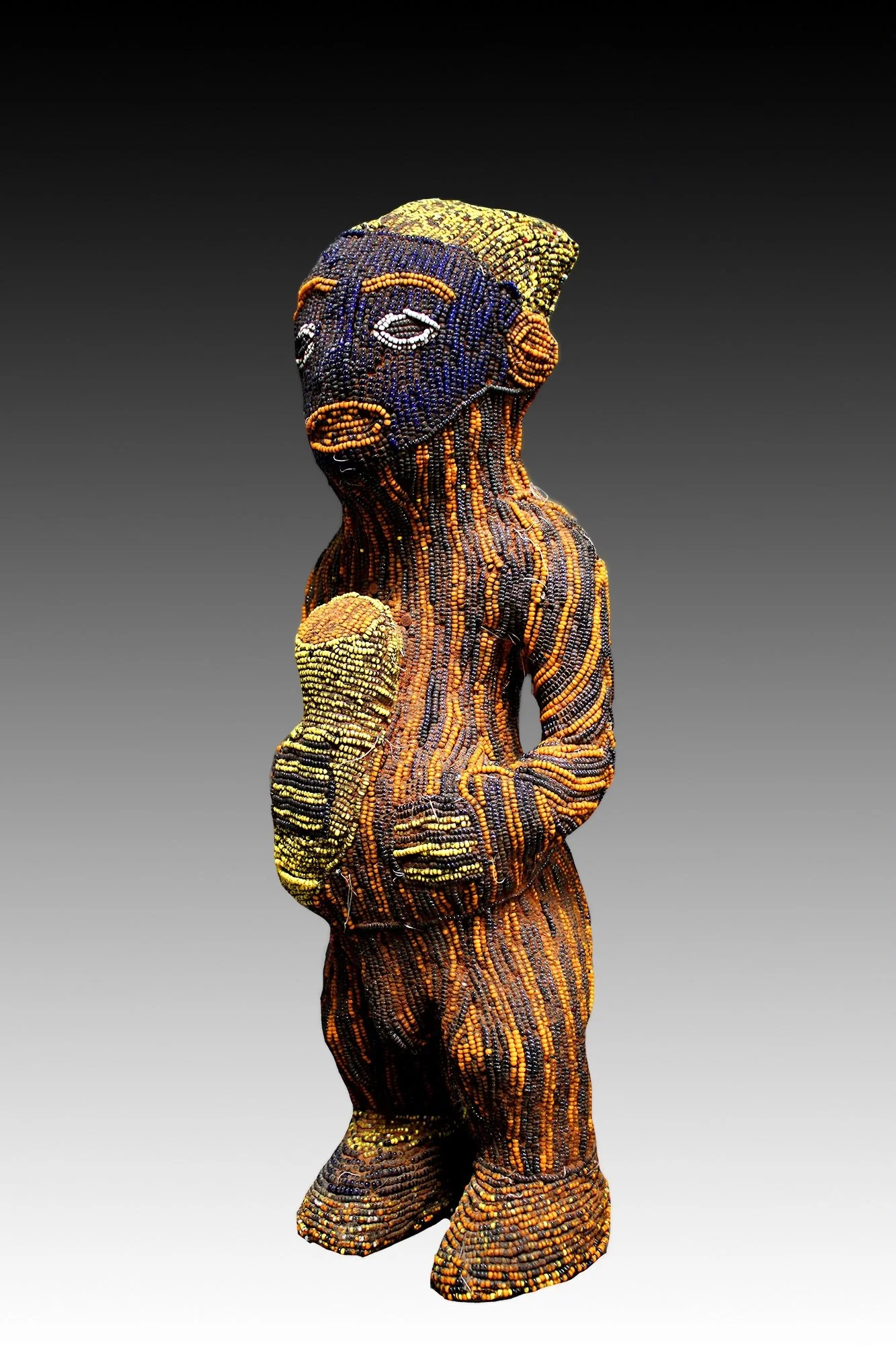 Bamun beaded figure from Cameroon.  www.intriguegallery.com