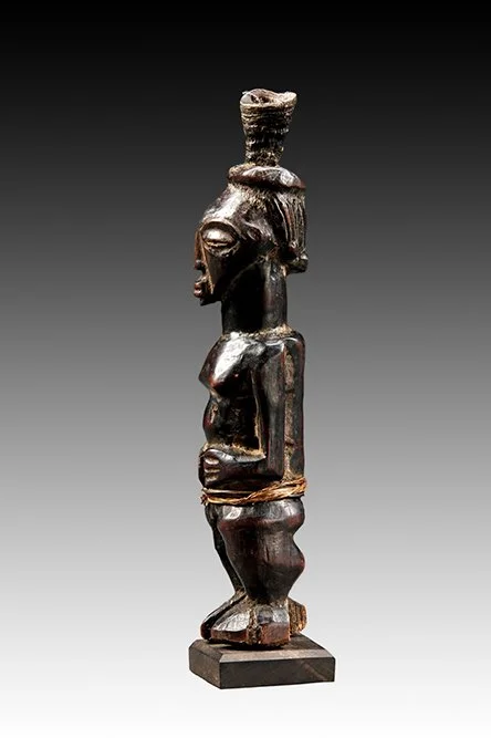 Museum quality Songye fetish figure with horn.  www.intriguegallery.com