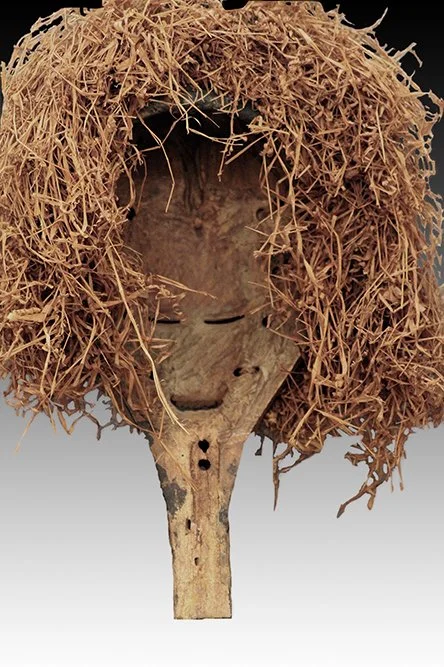Yaka mask, back view showing a collar of old raffia.  www.intriguegallery.com