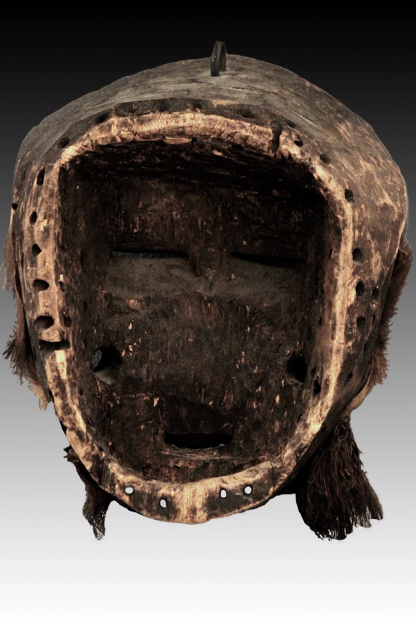 We mask or Wobe, Guere, back view, with fur and cow tail hair beard.  www.intriguegallery.com
