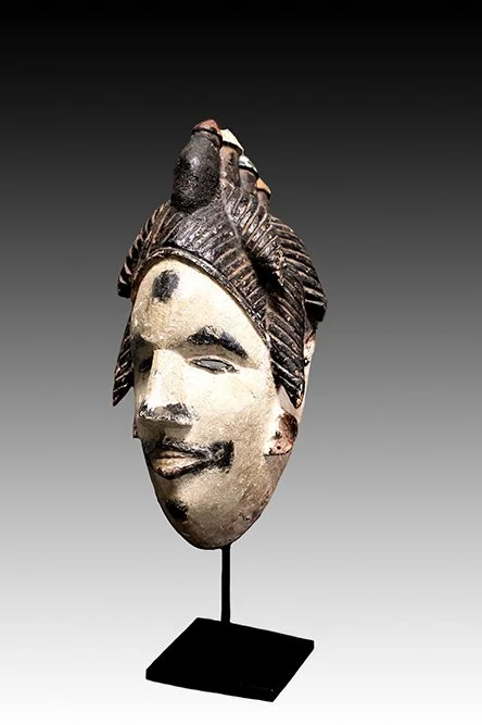 Igbo maiden white faced mask from Nigeria.  www.intriguegallery.com