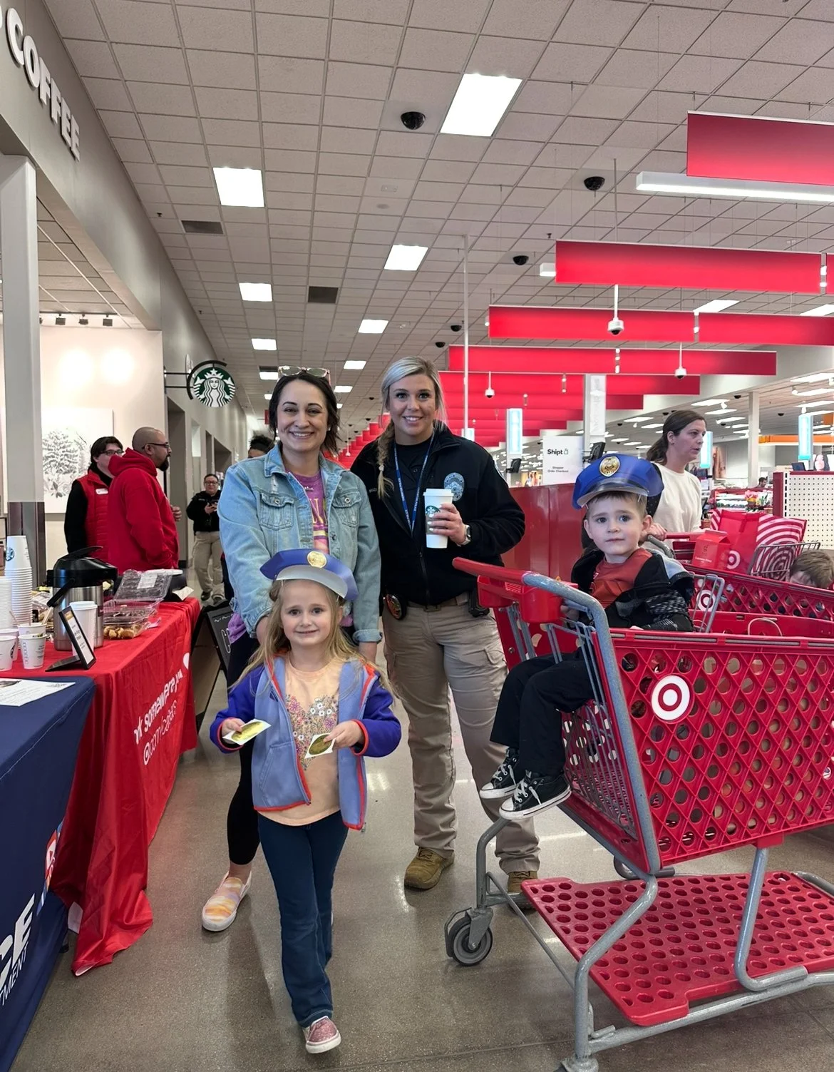officer having coffee with family in target
