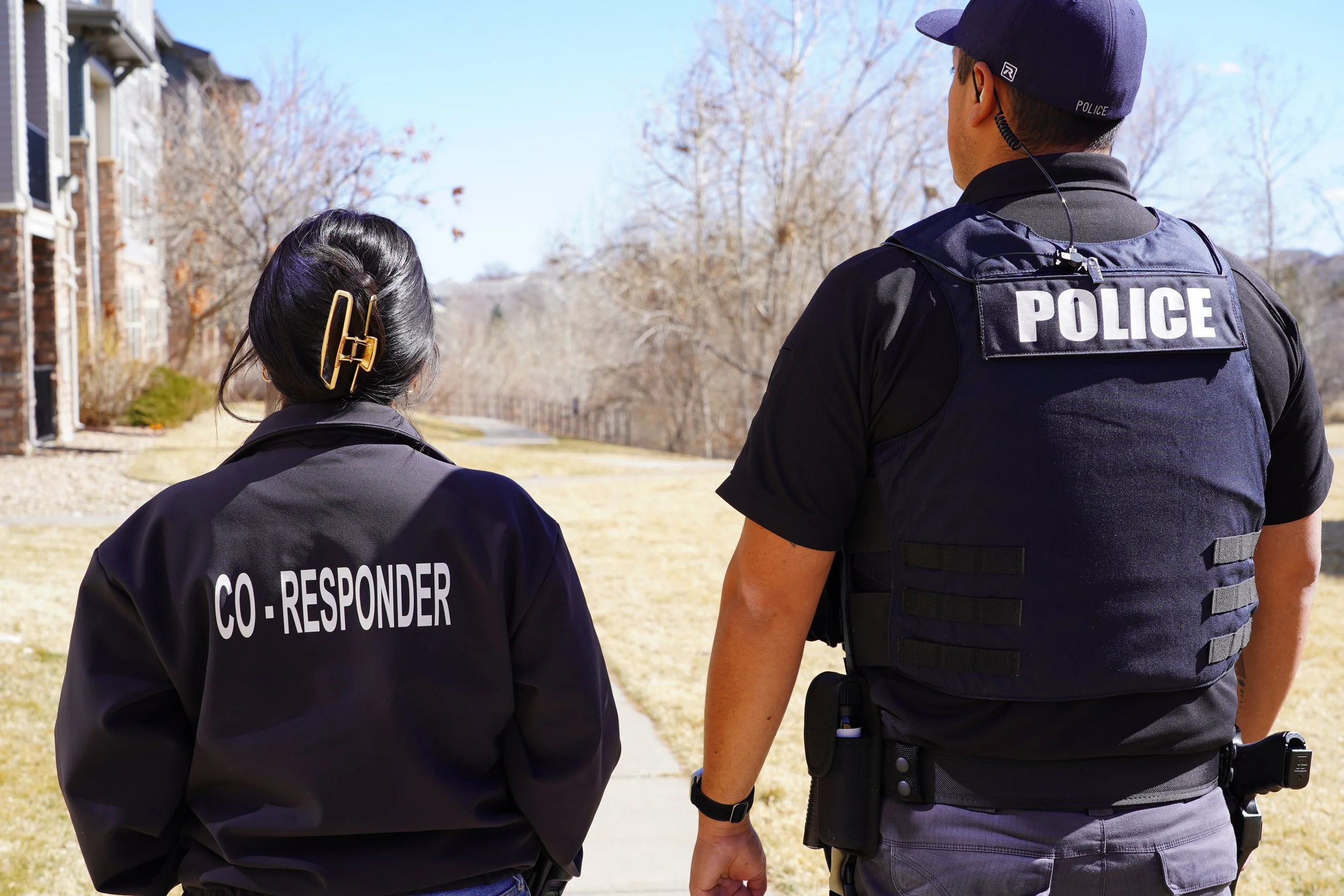 Co-Responder clinician next to police officer