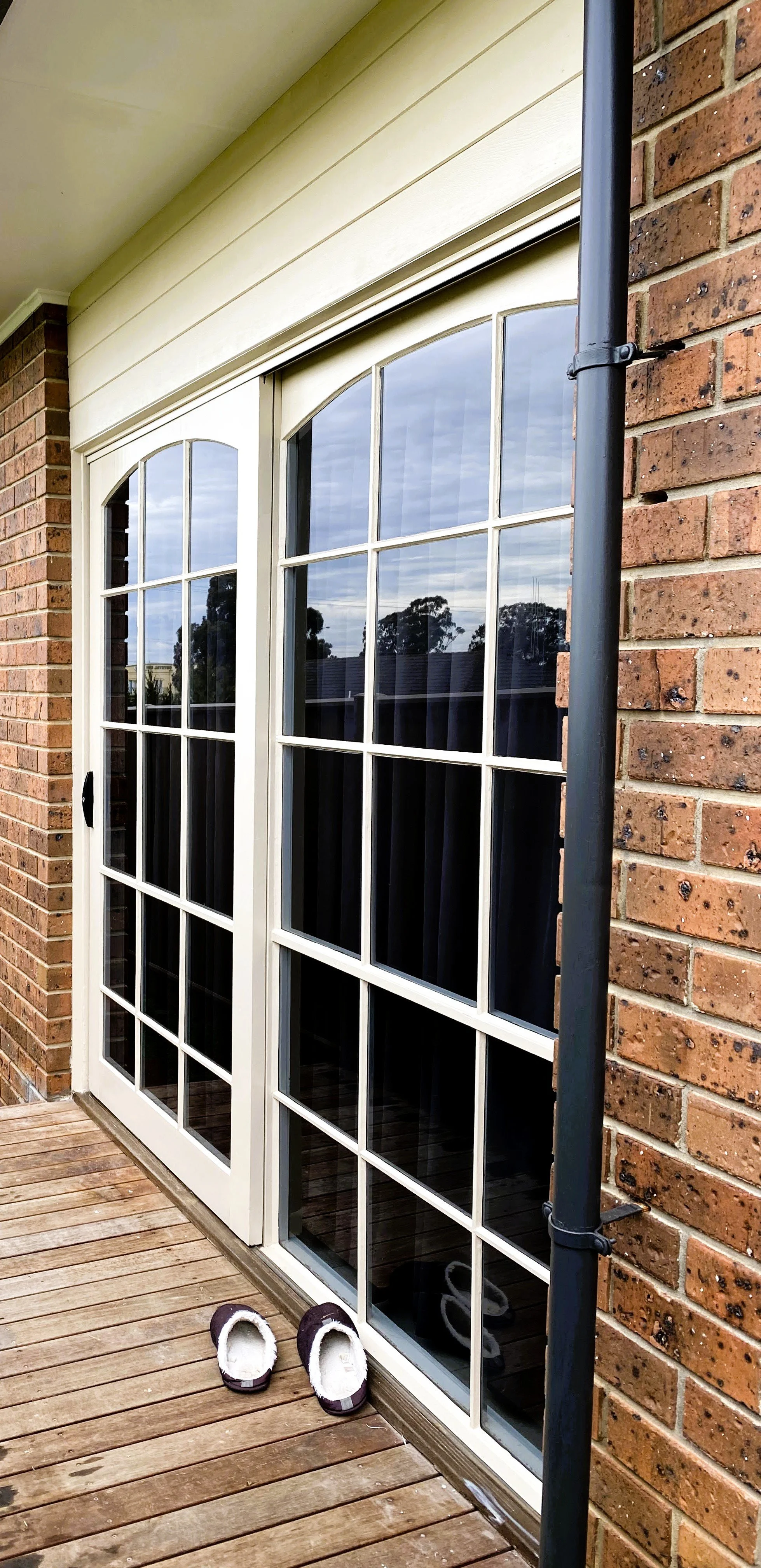 After photo showing restored Hamptons‑style door with crisp, premium repaint.