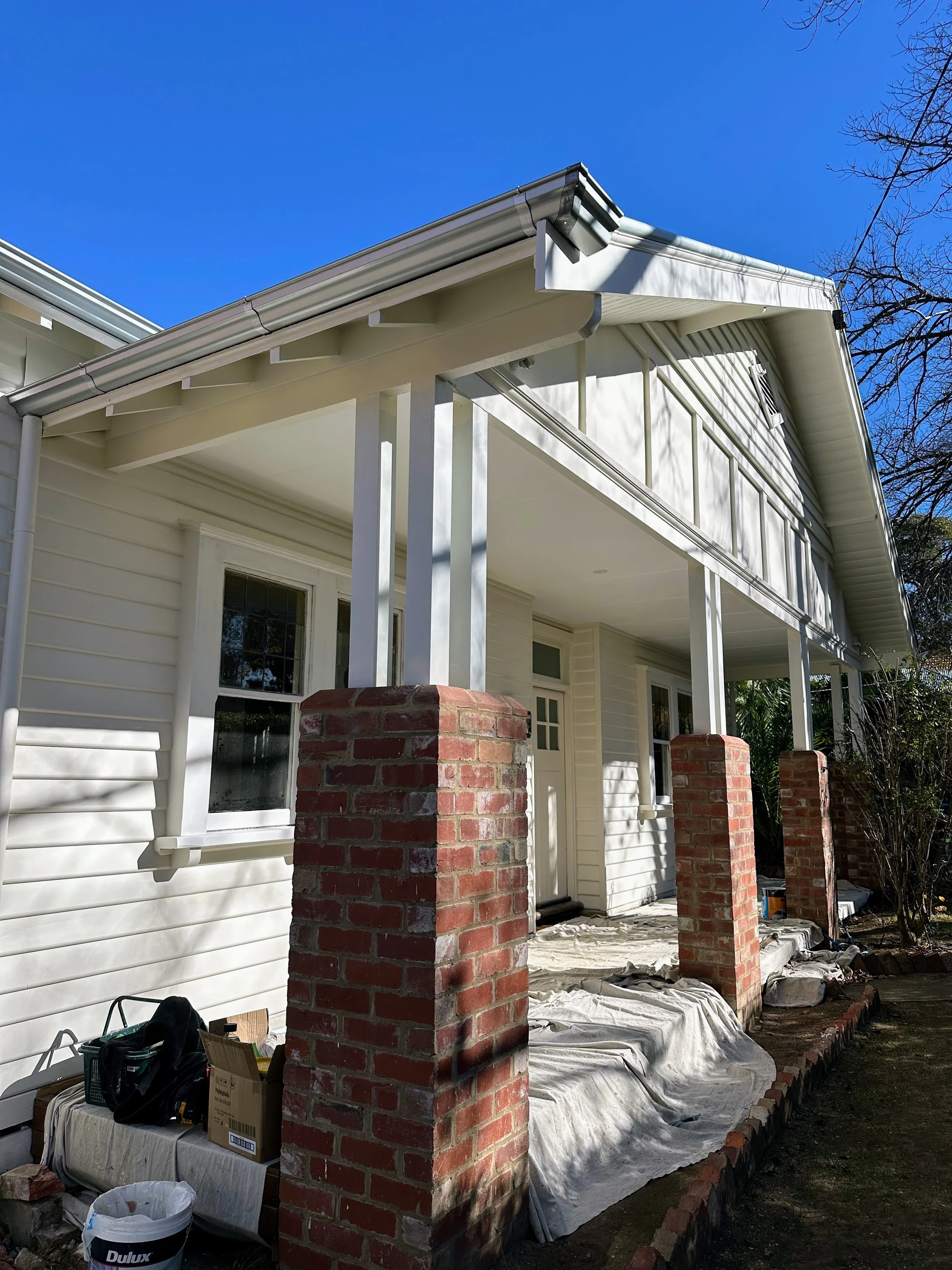 Full exterior repaint on a classic weatherboard home with smooth, even finish
