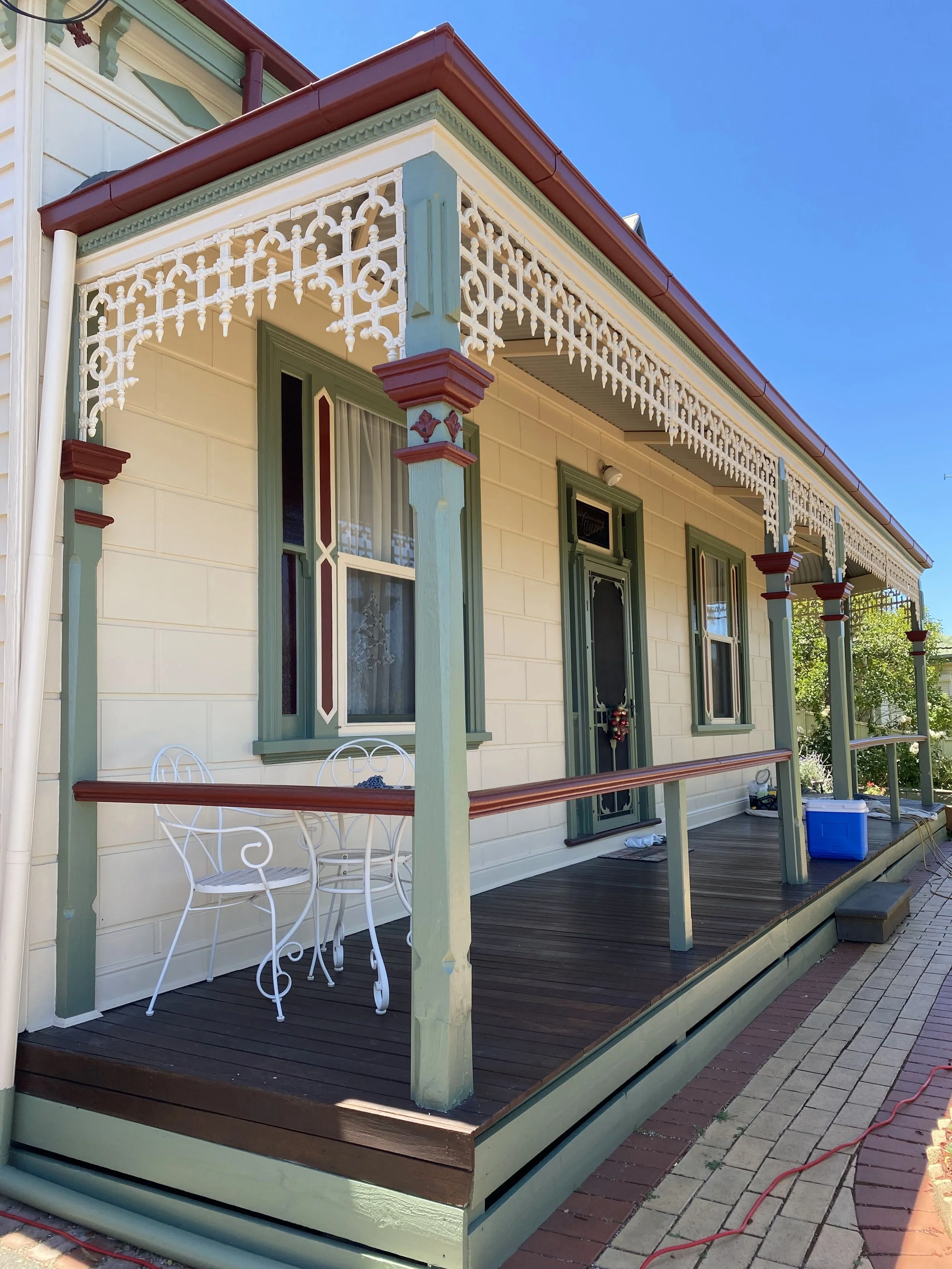 Front façade repaint on a Glen Iris weatherboard home with restored trims and windows.