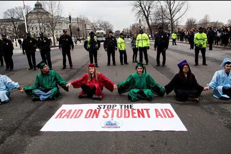 Photo taken in front of the Supreme Court of students blocking the road. Action organized by part of campaign ran by USSA & Justin