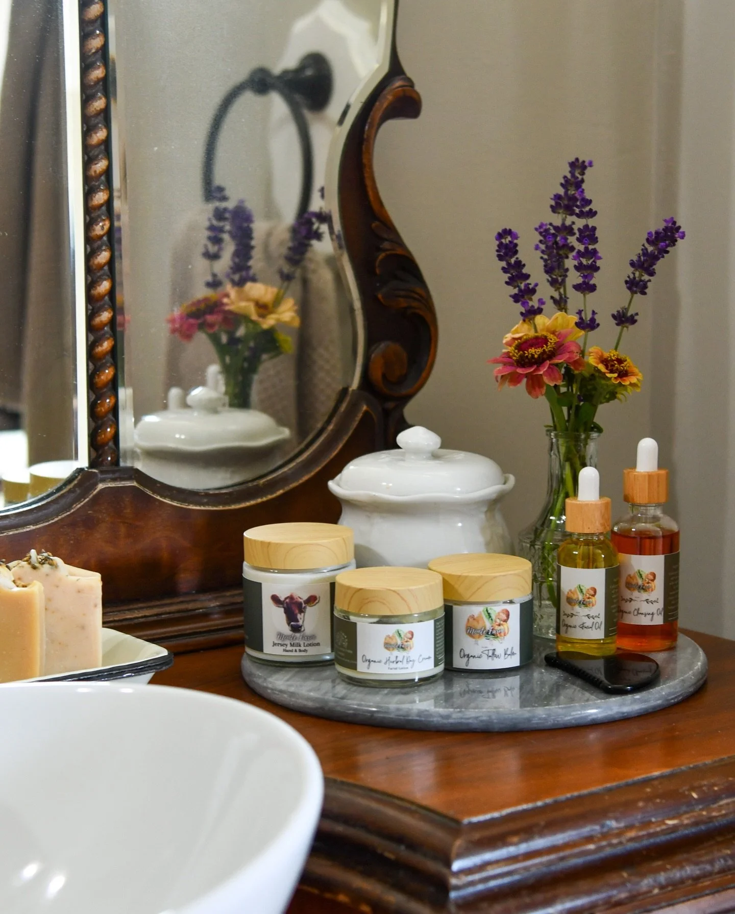 🌿✨My vanity featuring our small-batch, locally made tallow-based skincare products. Crafted with care, using only the highest quality organic ingredients, infused with flowers grown on the farm. It has taken me a hot minute to develop these so I am 