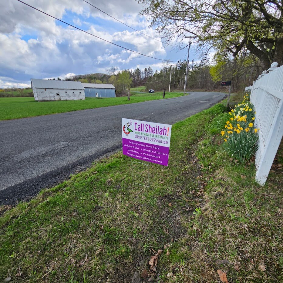 Our yard sign looks great with fence line daffodils, don't you think?

If you'd rather focus on your beautiful spring flowers than the piles of stuff in your basement, garage, or attic that you waited all winter to get rid of, give us a call at 518.9