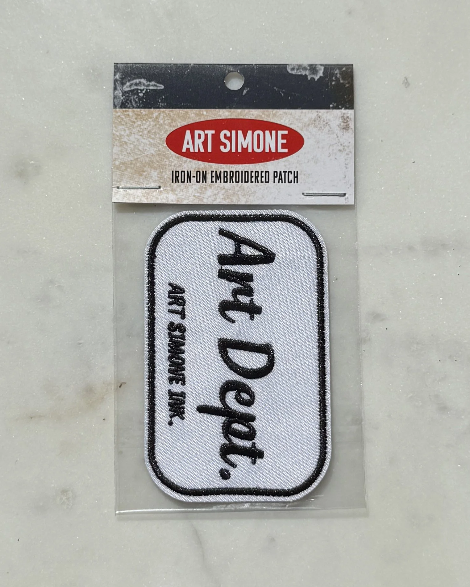Art Dept Patch Black in packaging.jpg