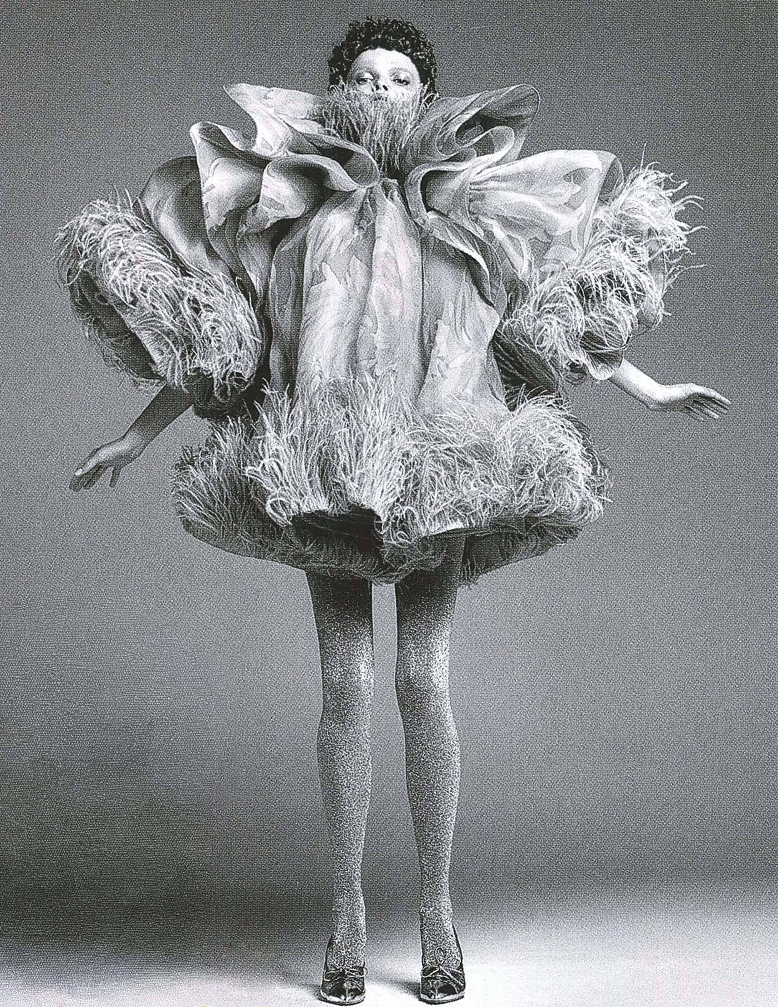 MJ_S19_BLUFEATHERDRESS_JUMPINGStevenKlein-2_RES150.jpg