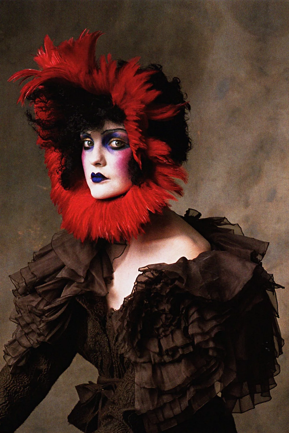 GALLIANO_F07_BROWNPLEATFRILLJACKETb_VOGUE_RES150.jpg