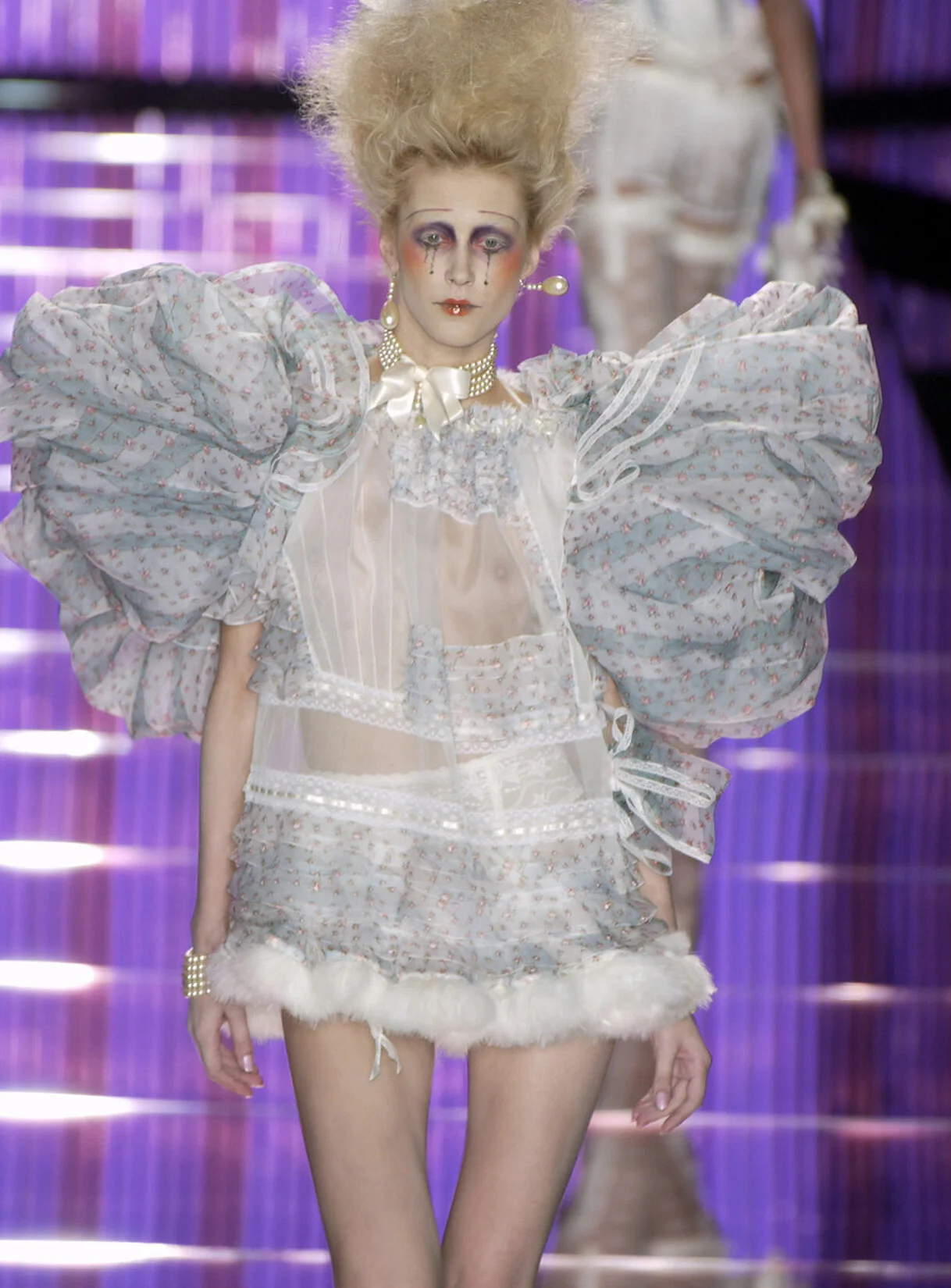 GALLIANO_S04_BLUEORGANZAMINIDRESS_RUNWAY_RES150_CROP.jpg