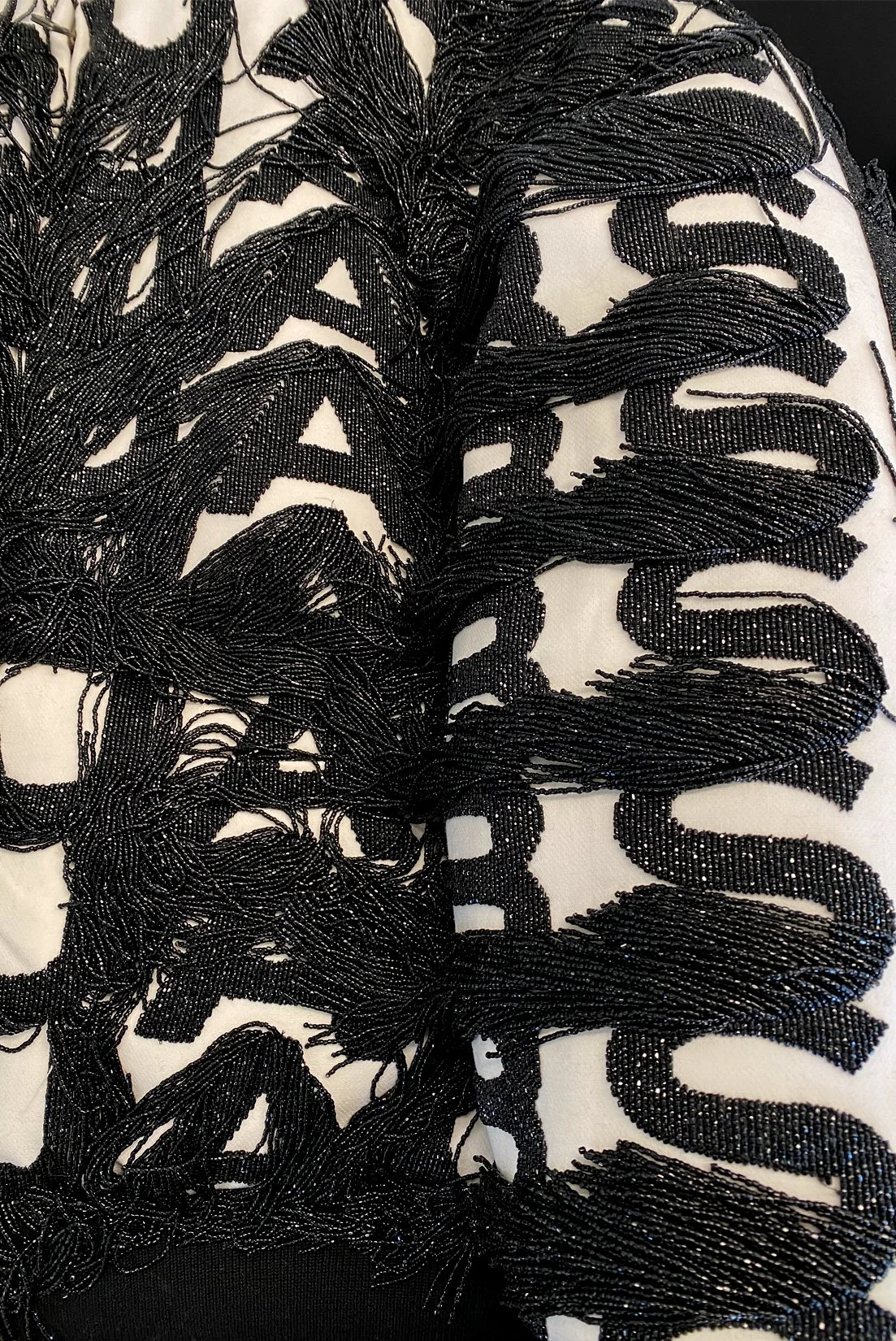 MJ_F21_LOGOBEADEDFRINGE_BOMBER_DETAIL_RES150.jpg